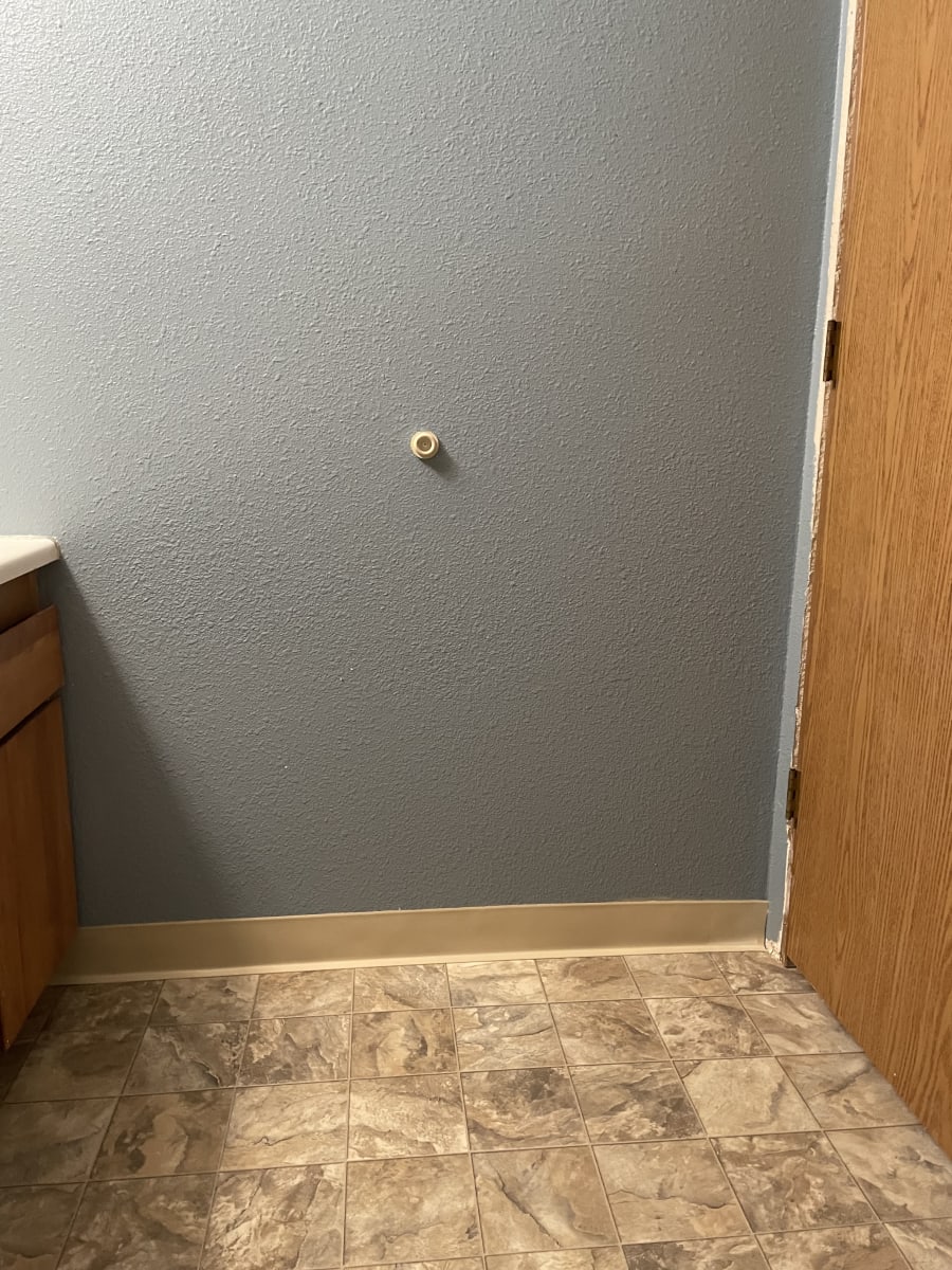 repairing wall texture in bathroom after