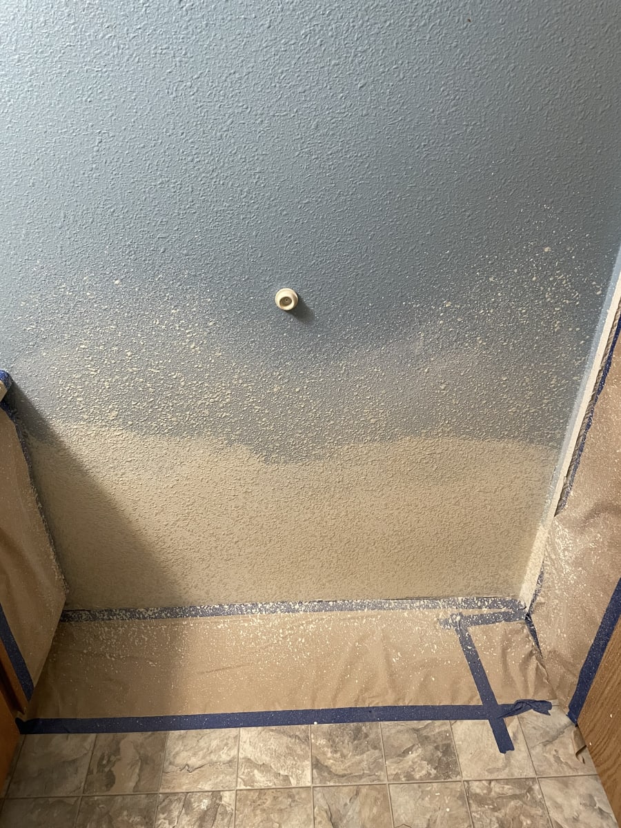 repairing wall texture in bathroom before