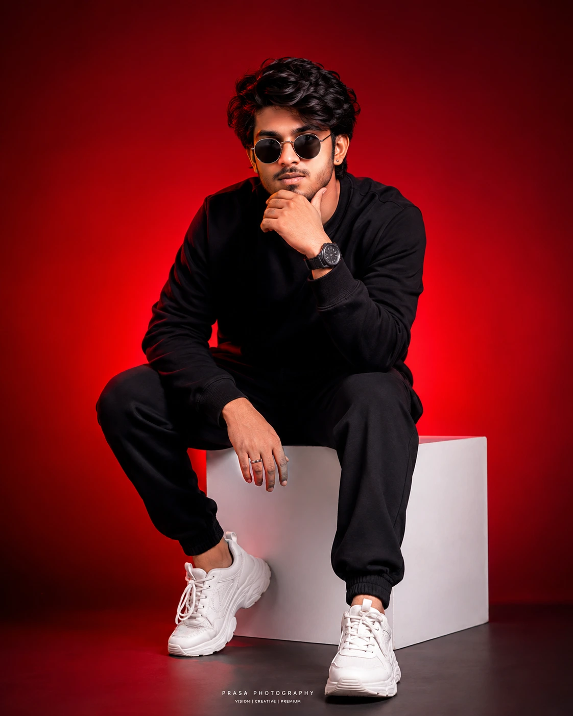 Red Studio Portrait with Sunglasses