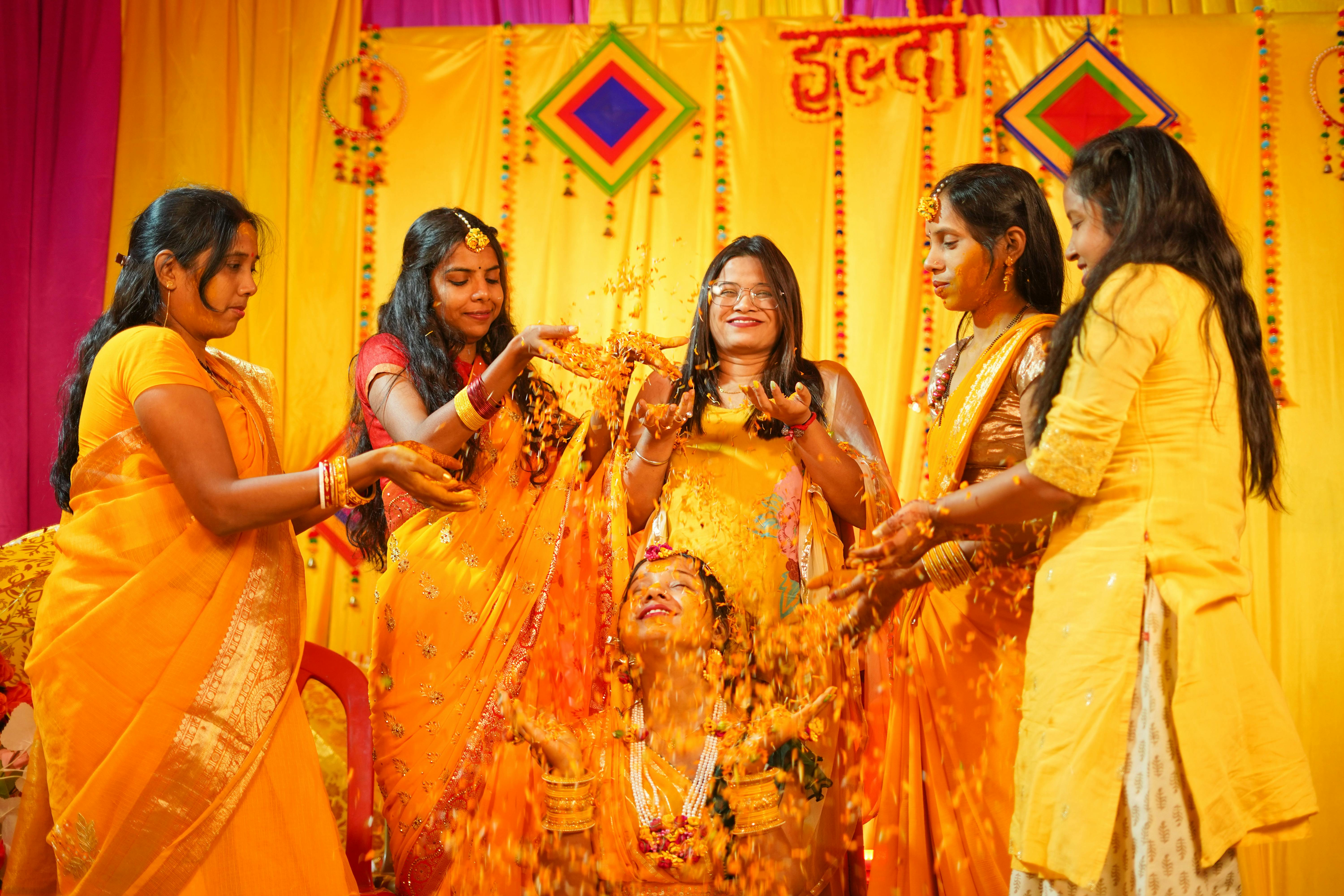 A happy couple during their Haldi ceremony.