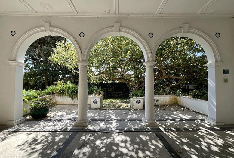 Three arches opening towards the garden