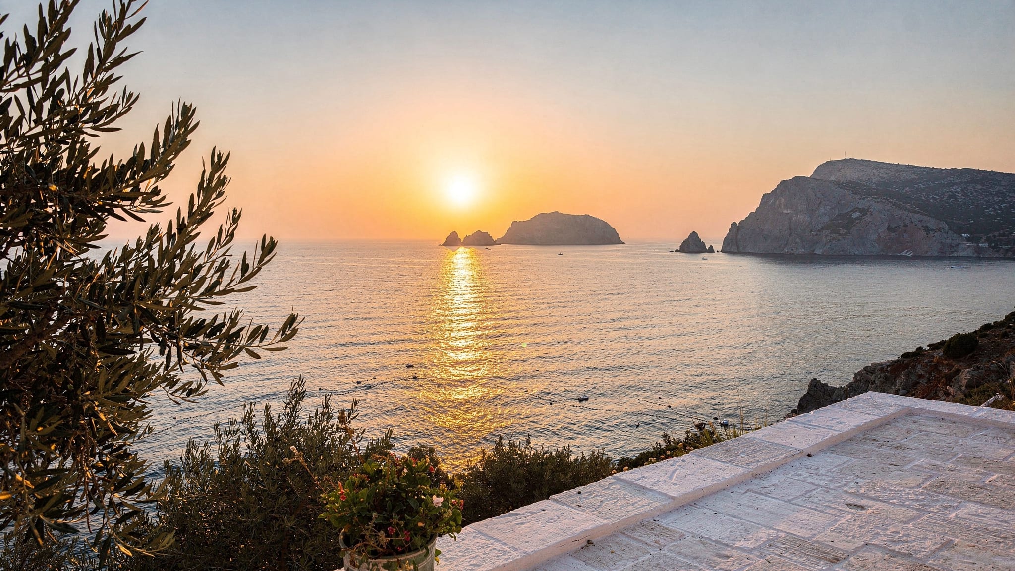 Sunrise over a calm Mediterranean bay