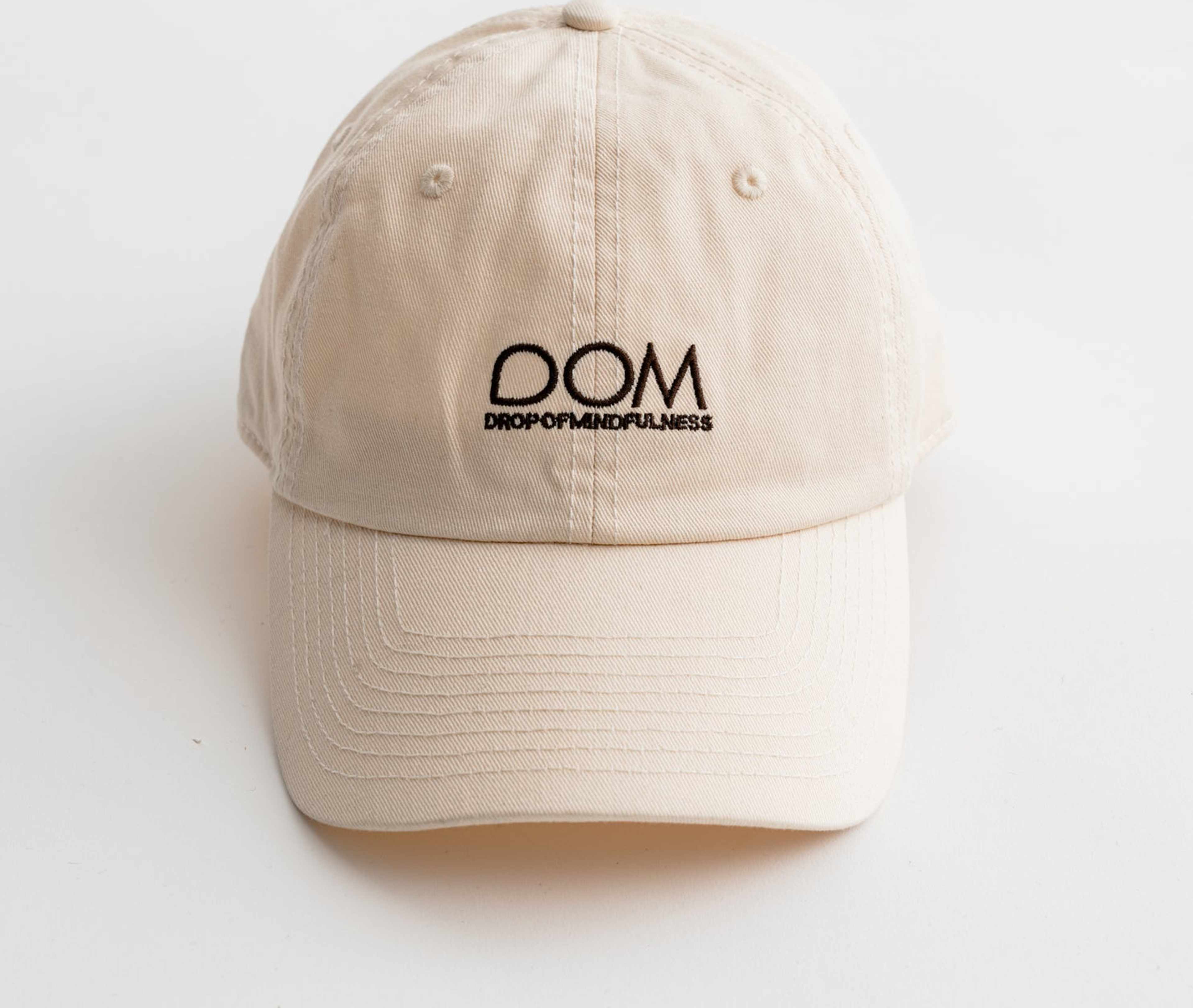 Cap Lifestyle, från Drop of Mindfulness, i färgen cream. Klicka för att öppna bilden i stort format