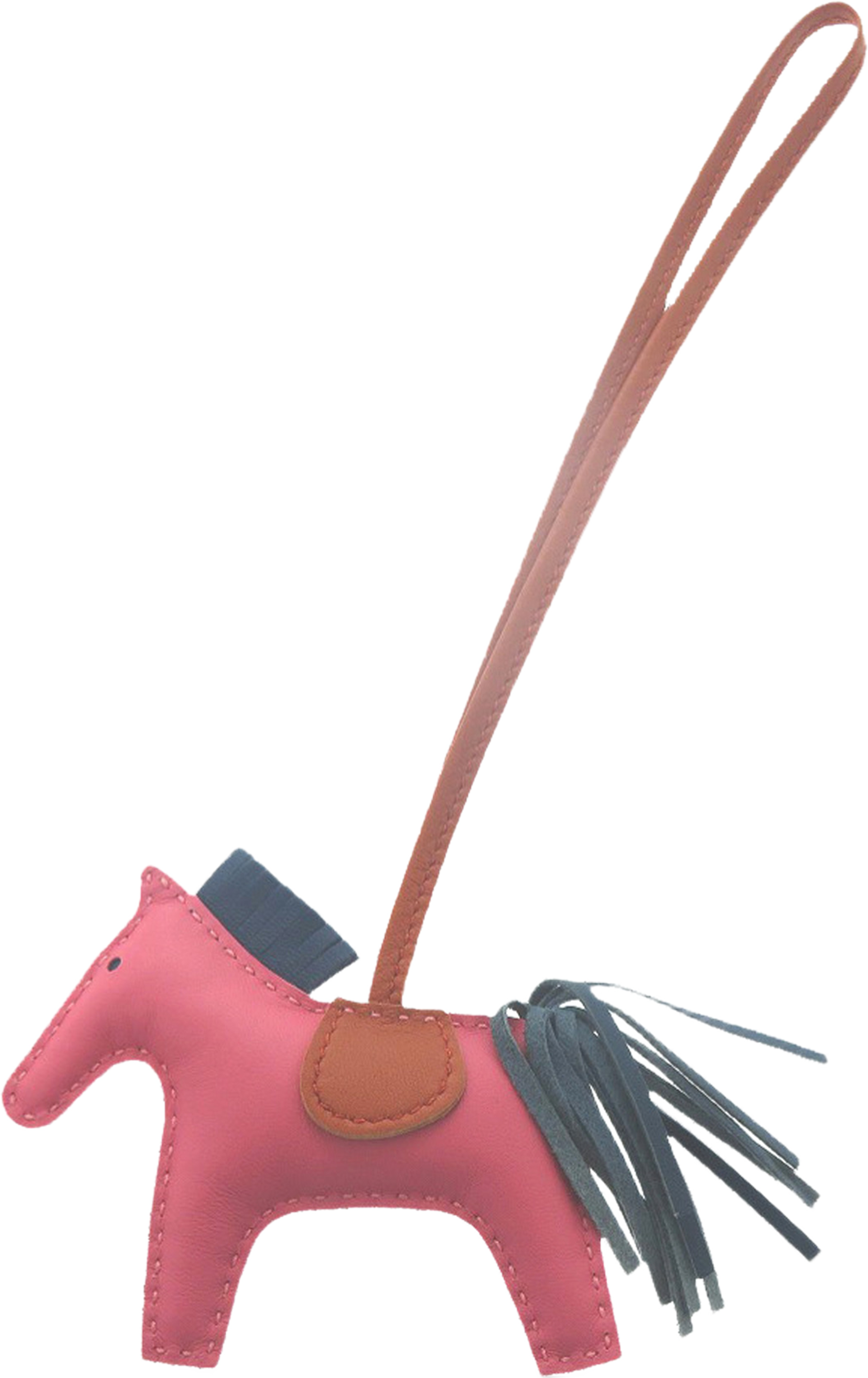 Hermès Milo Lambskin And Swift Grigri Rodeo Bag Charm Pm, från Luxclusif, i färgen rosa. Klicka för att öppna bilden i stort format
