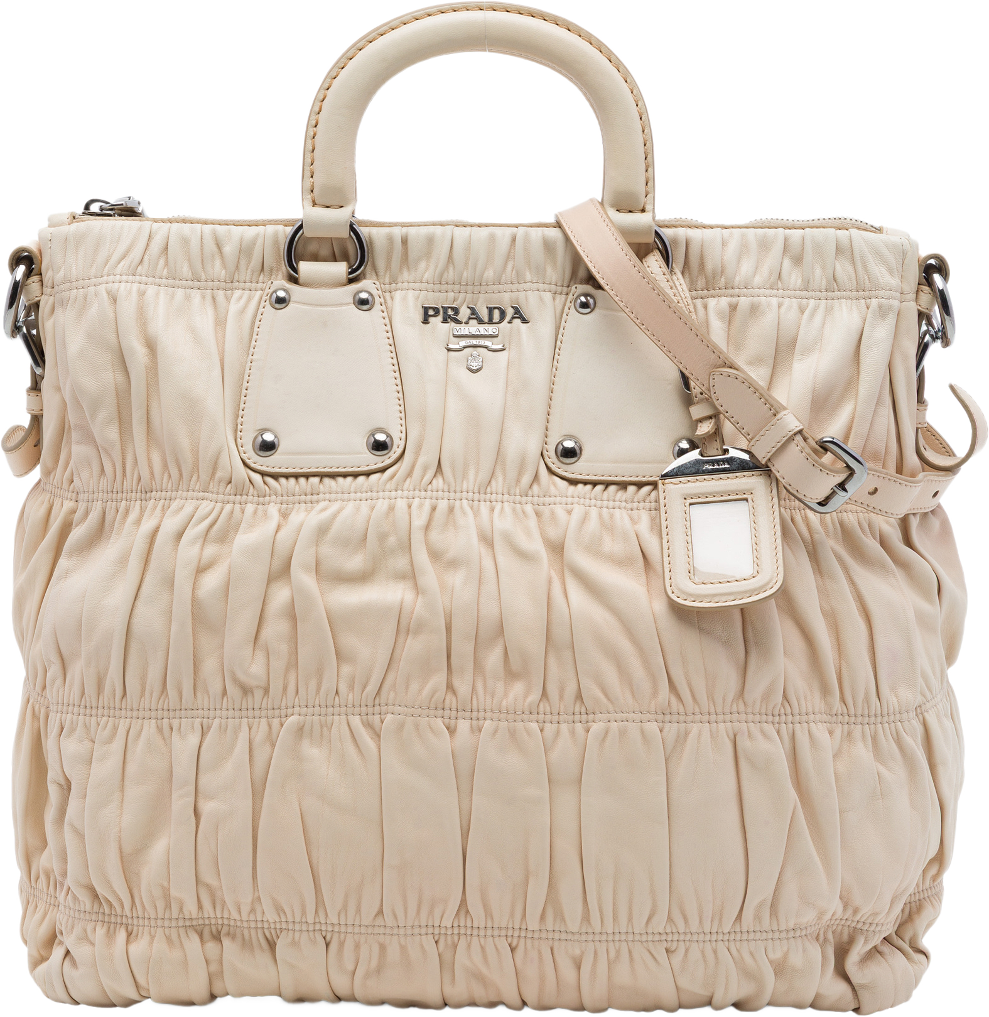 Prada Nappa Gaufre Satchel, från Luxclusif, i färgen beige. Klicka för att öppna bilden i stort format
