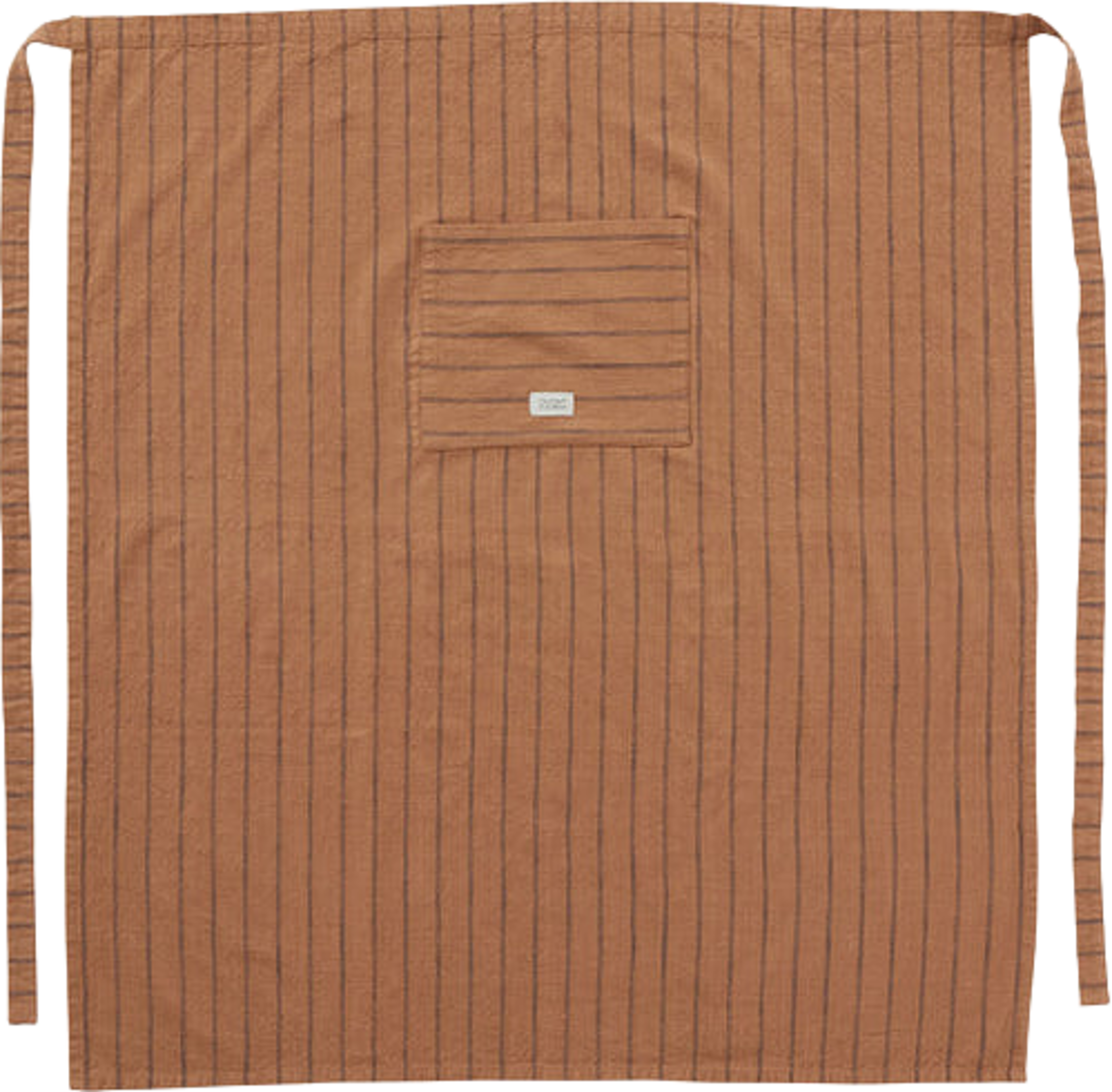 Gobi Chef Apron, från OYOY Living, i färgen dark caramel. Klicka för att öppna bilden i stort format