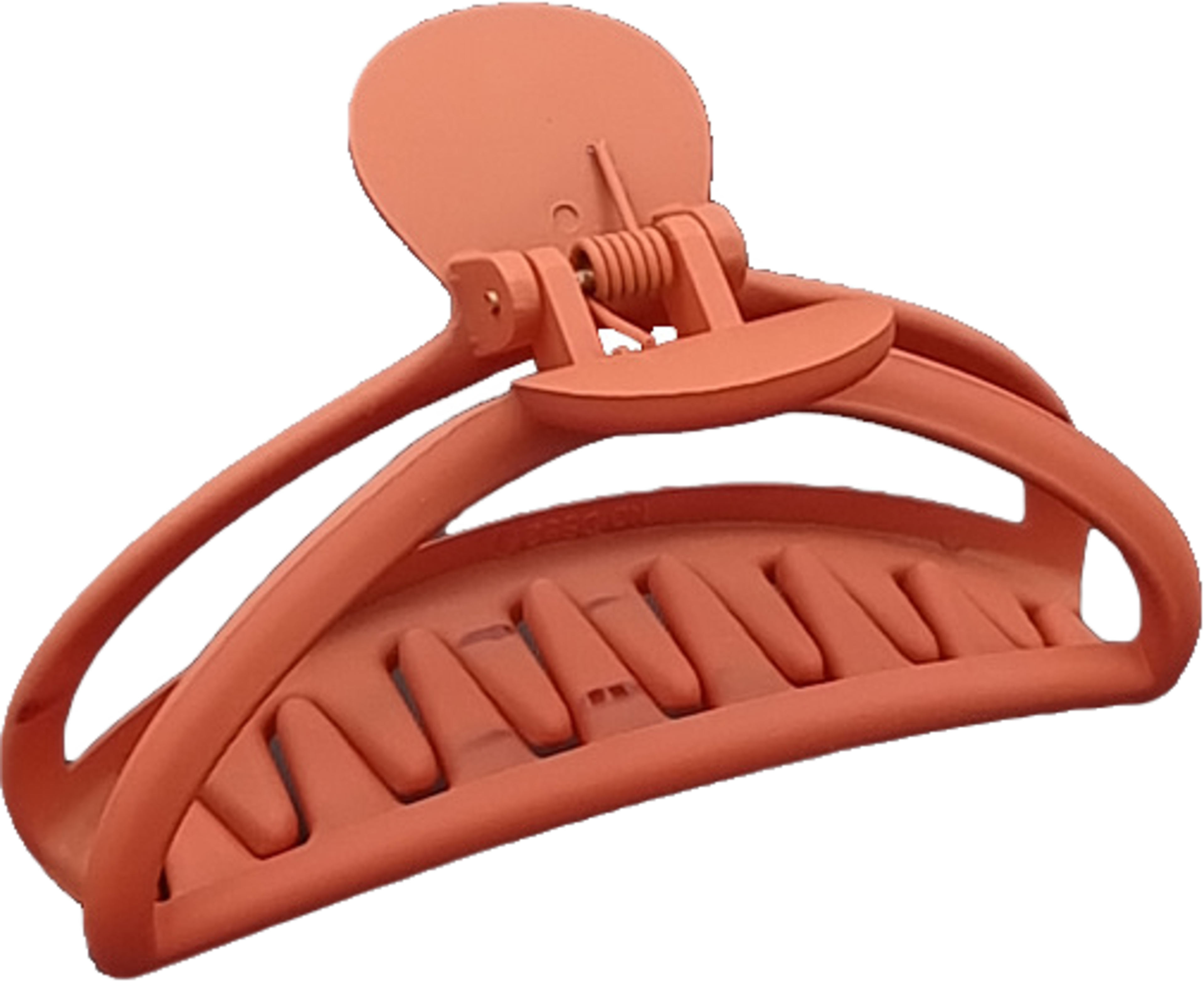 Gummerad Hårklämma, från Complement, i färgen orange. Klicka för att öppna bilden i stort format