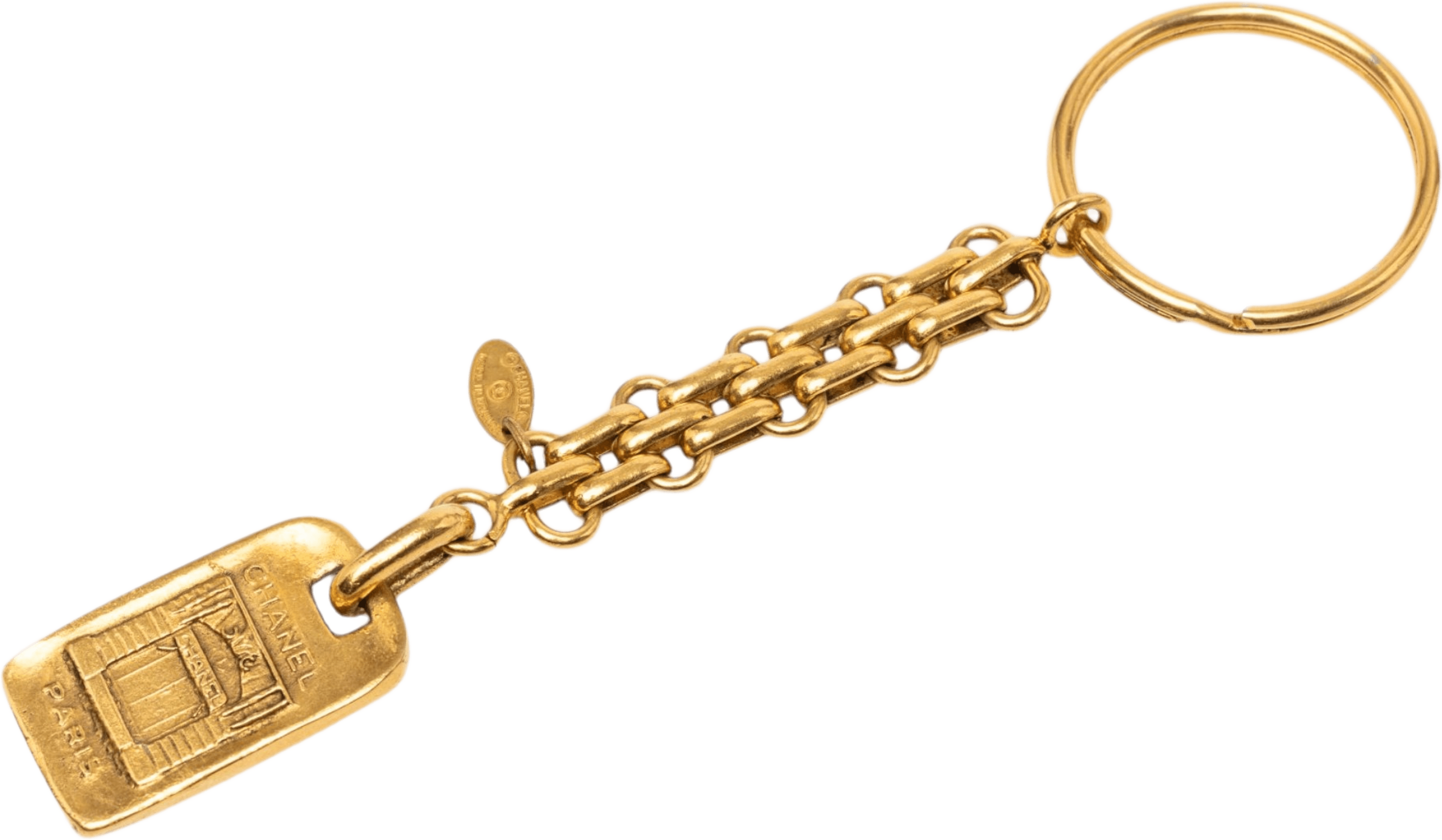 Chanel Gold Plated Logo Paris Key Ring Bag Charm, från Luxclusif, i färgen guld. Klicka för att öppna bilden i stort format