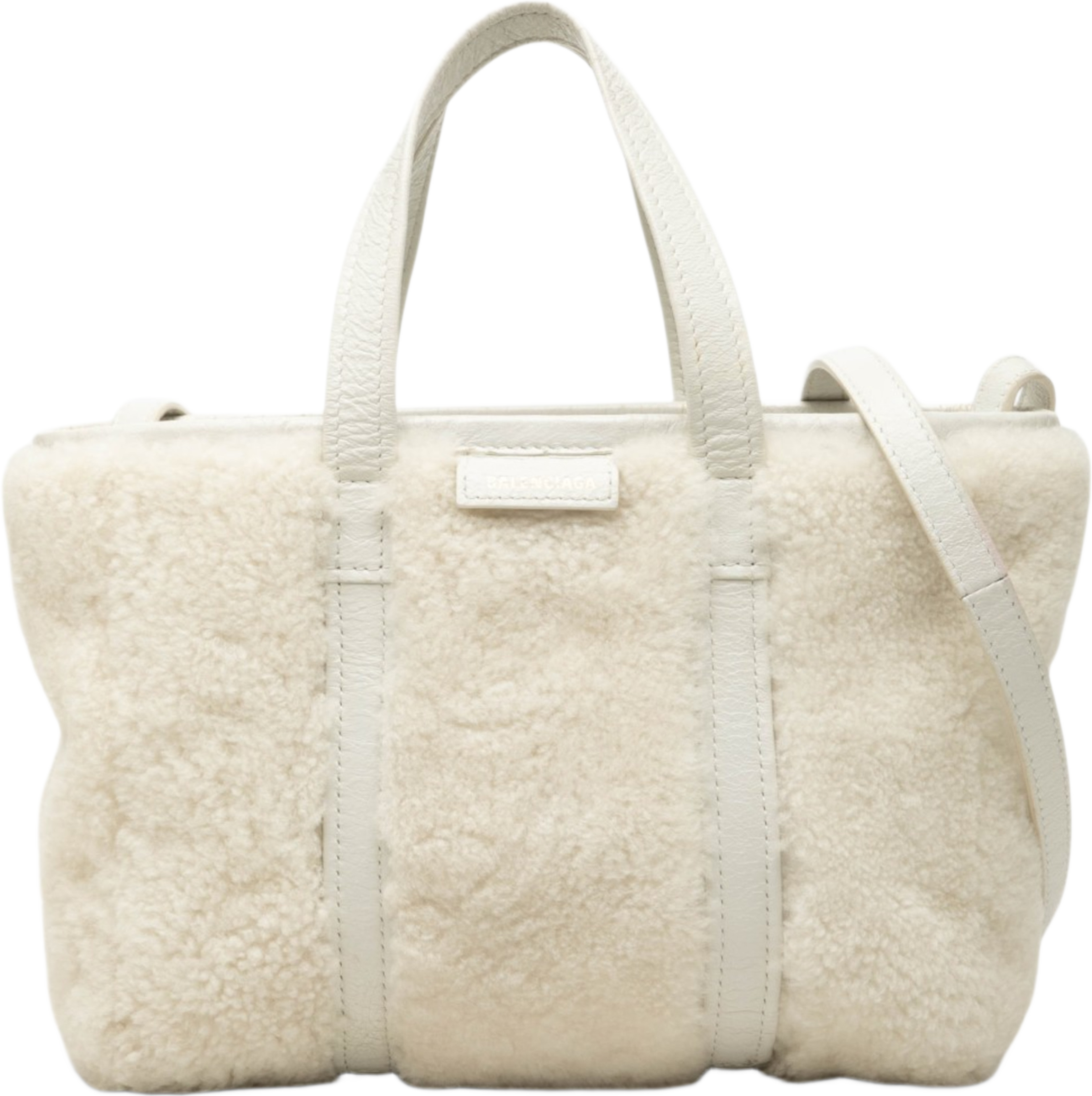 Balenciaga Small Shearling And Leather Barbes East West Shopper Tote, från Luxclusif, i färgen vit. Klicka för att öppna bilden i stort format
