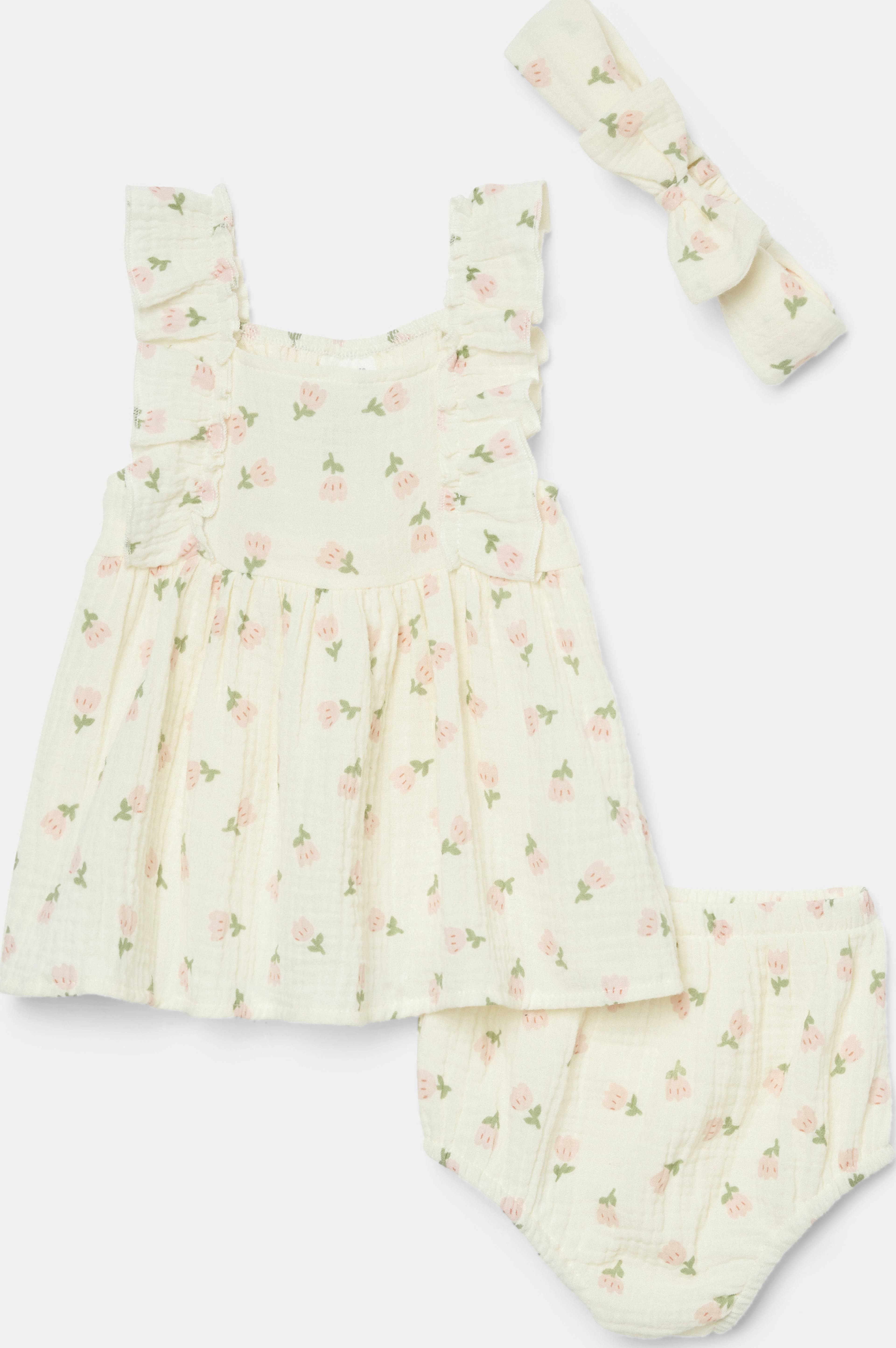 Krinklat klänningset NILLA, från RIKIKI, i färgen Pink Flower. Klicka för att öppna bilden i stort format