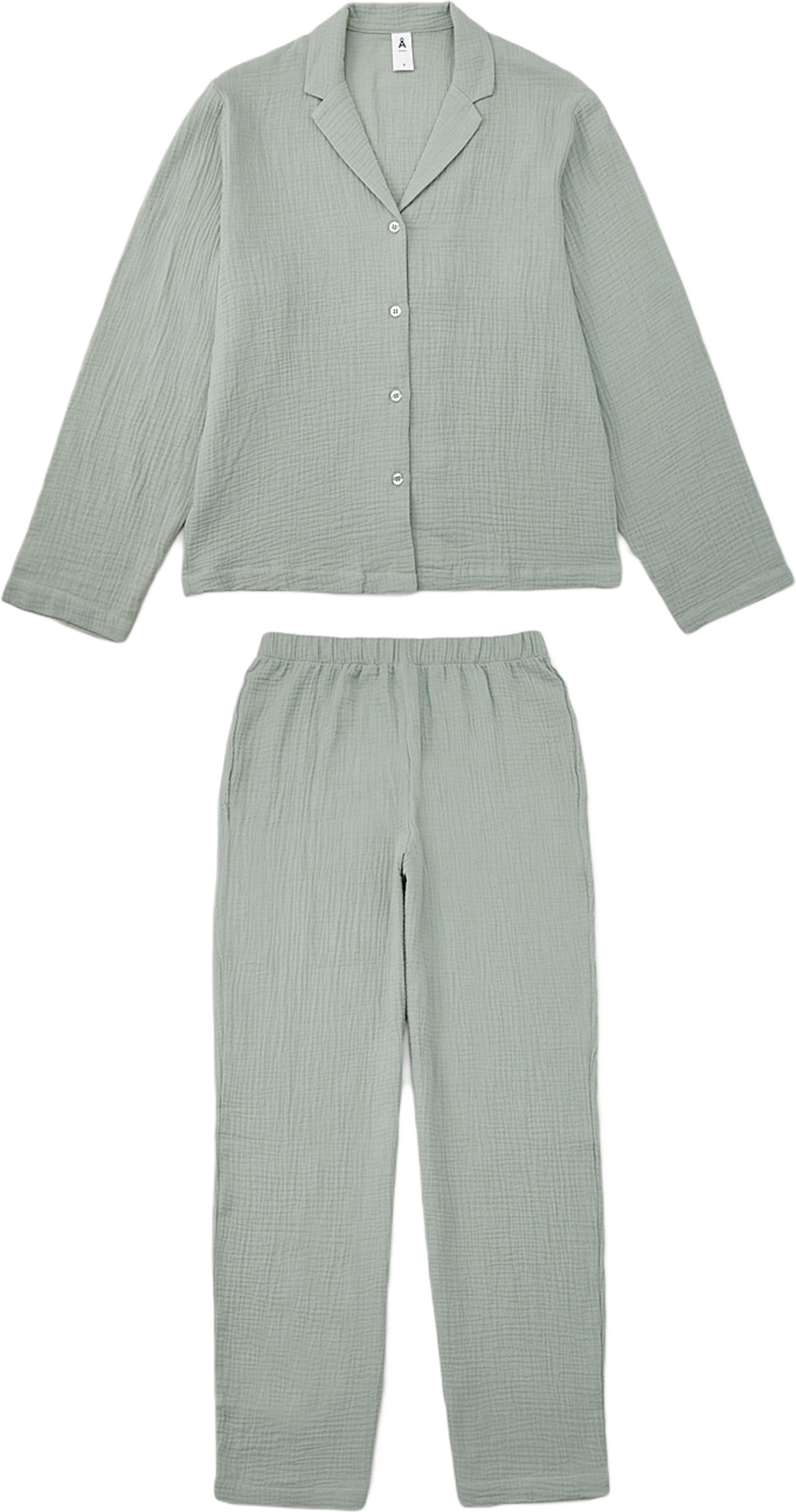 Pyjamas i bomullsmuslin MILLE, från Å WOMAN, i färgen Light Green. Klicka för att öppna bilden i stort format
