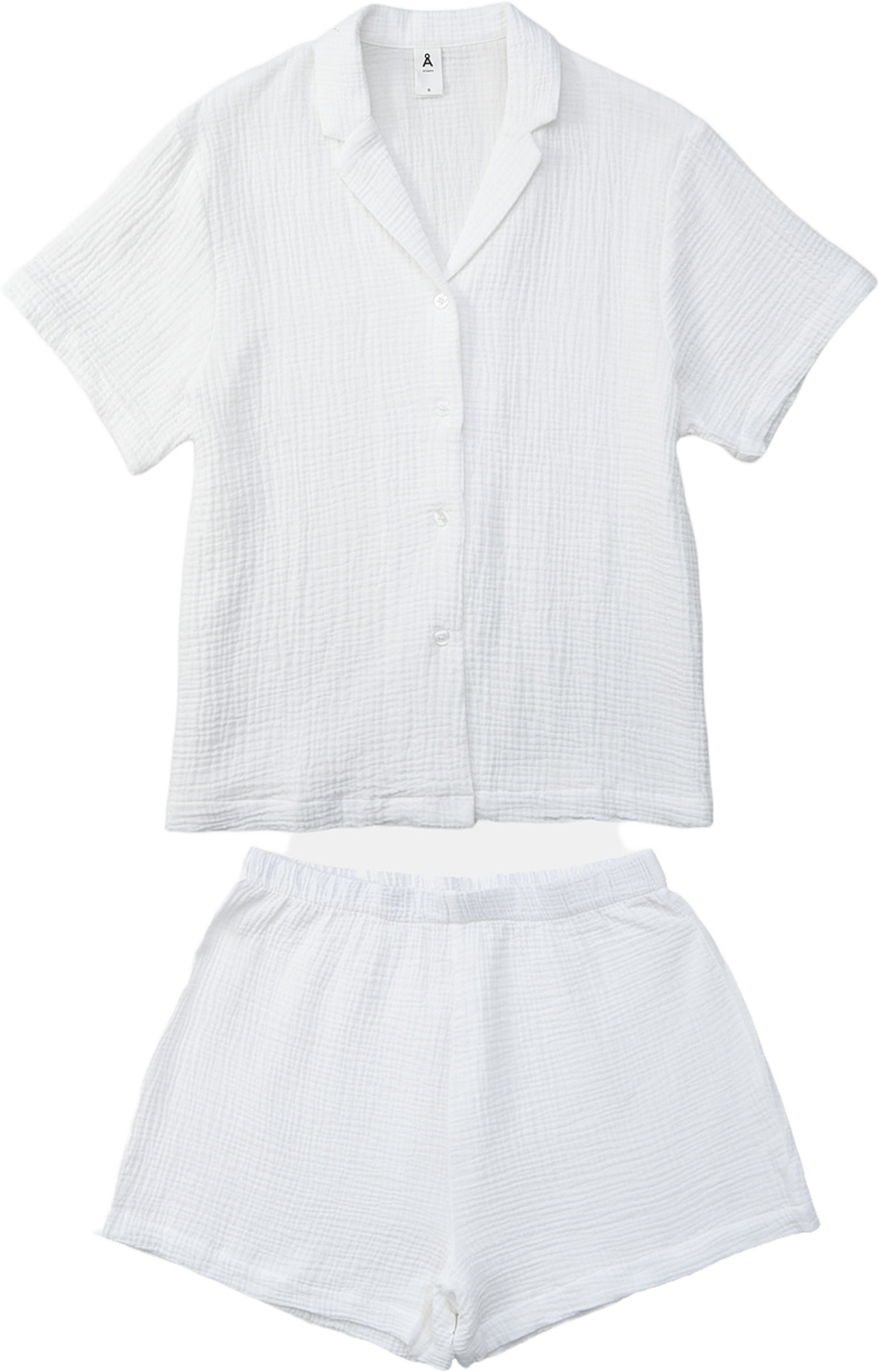 Pyjamas i bomullsmuslin MIO, från Å WOMAN, i färgen Off White. Klicka för att öppna bilden i stort format