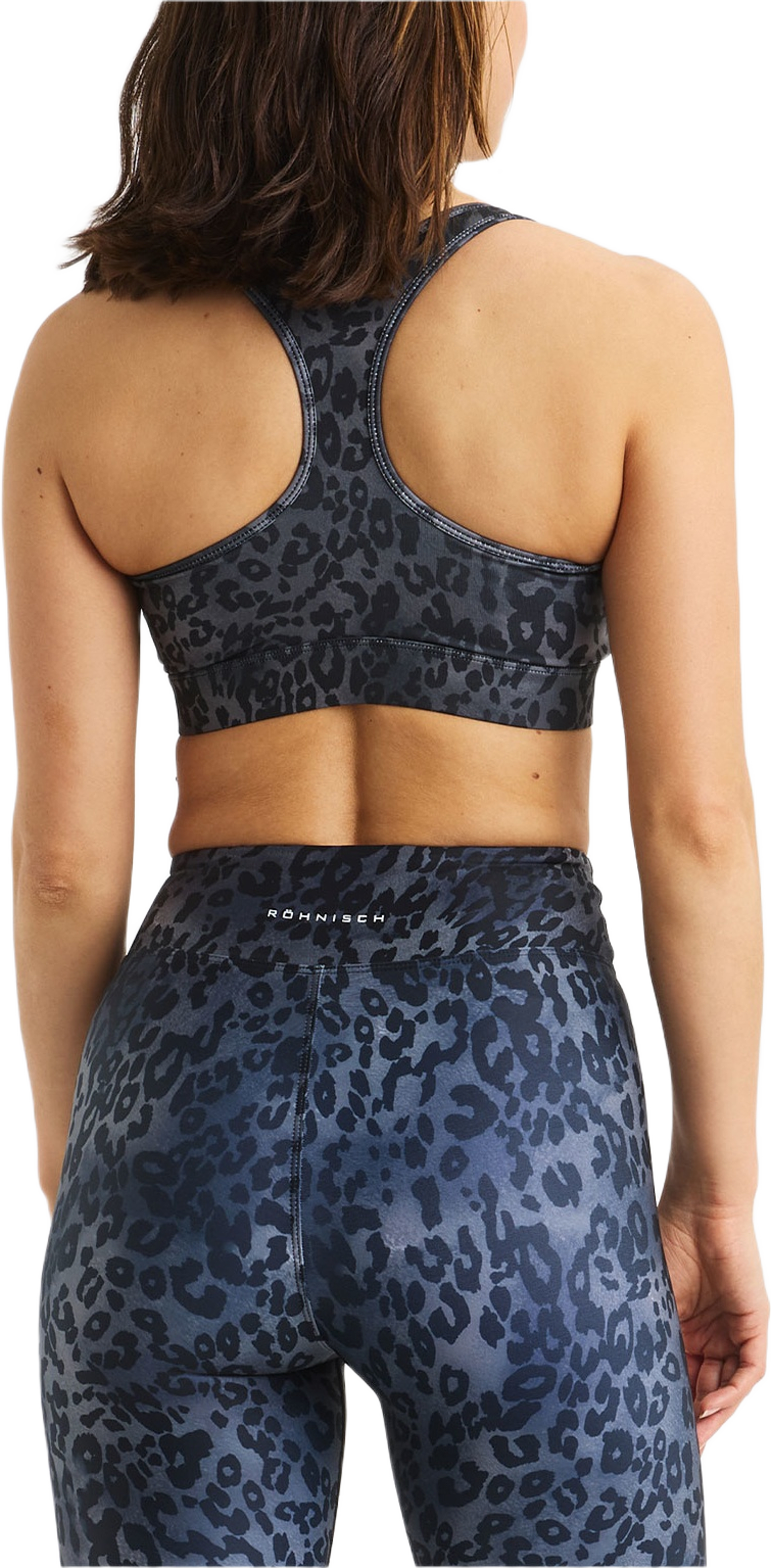 Essential Zip Sportsbra, från Röhnisch, i färgen Grey Leo Print.