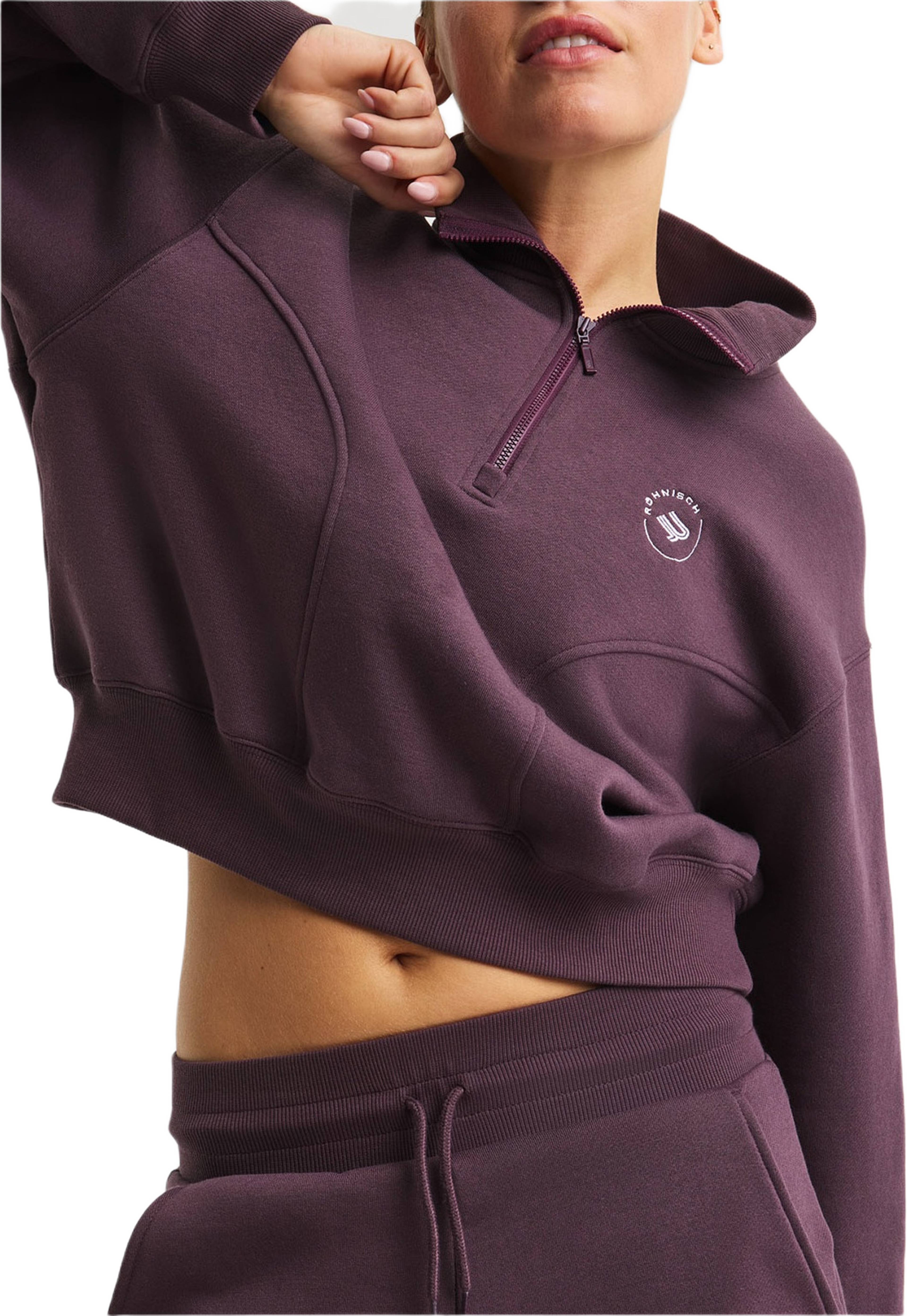 Soft Sweat Half Zip, från Röhnisch, i färgen Huckleberry.