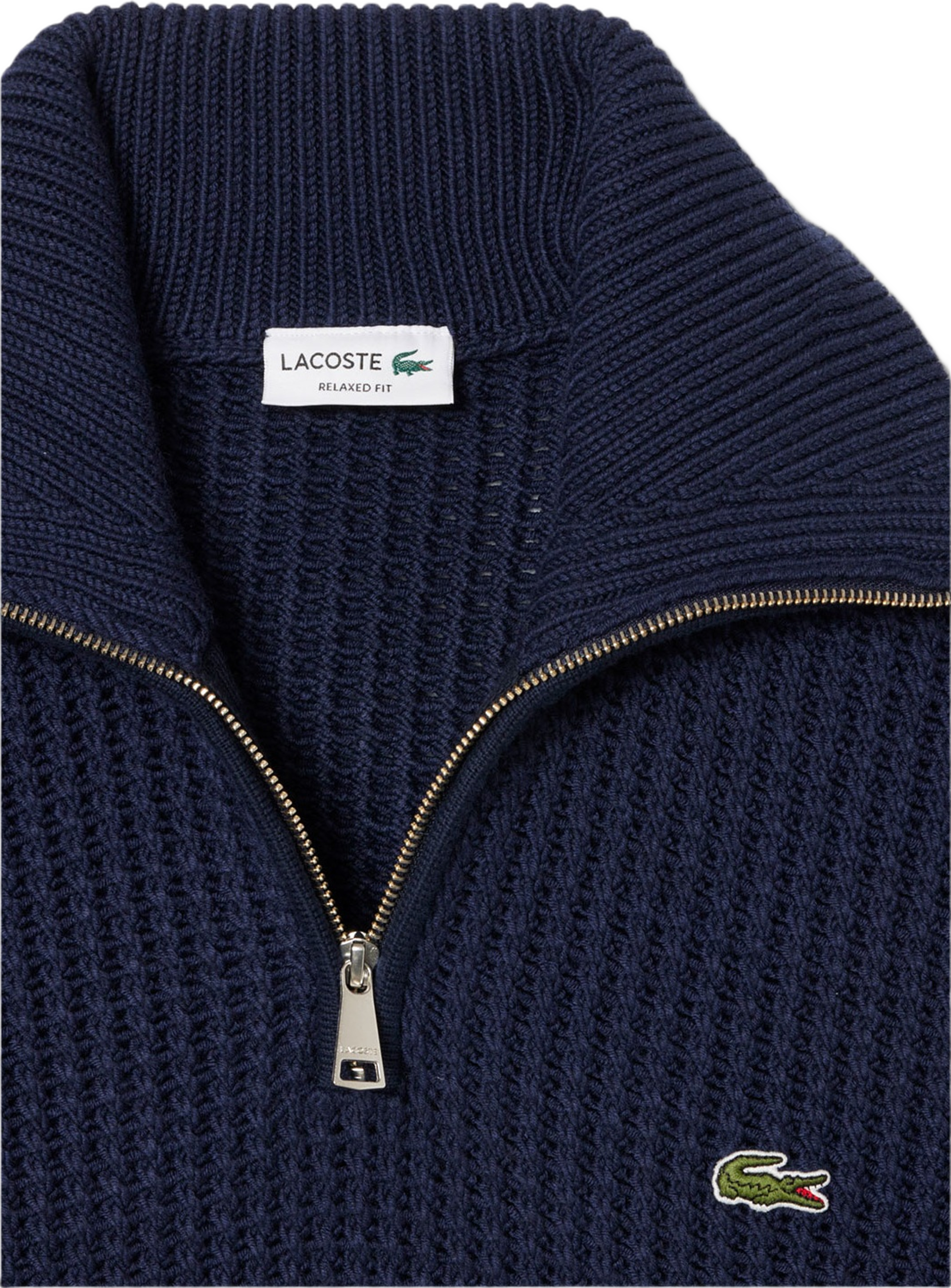 High Neck Half Zipper Heavy Wool Sweater, från Lacoste, i färgen Navy Blue.