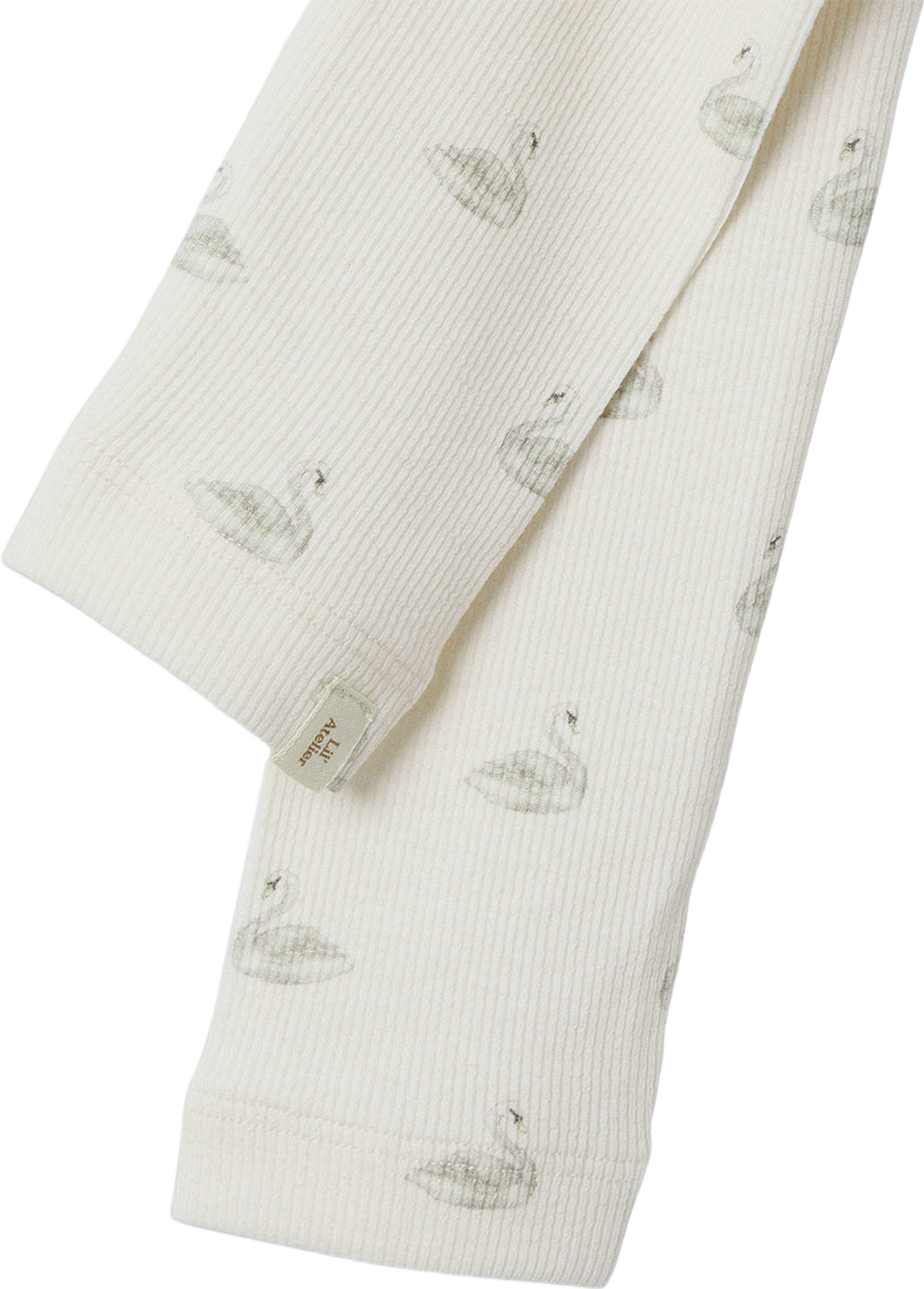 Gavo slim leggings, från Lil'Atelier, i färgen Pastel Parchment Swan. Klicka för att öppna bilden i stort format