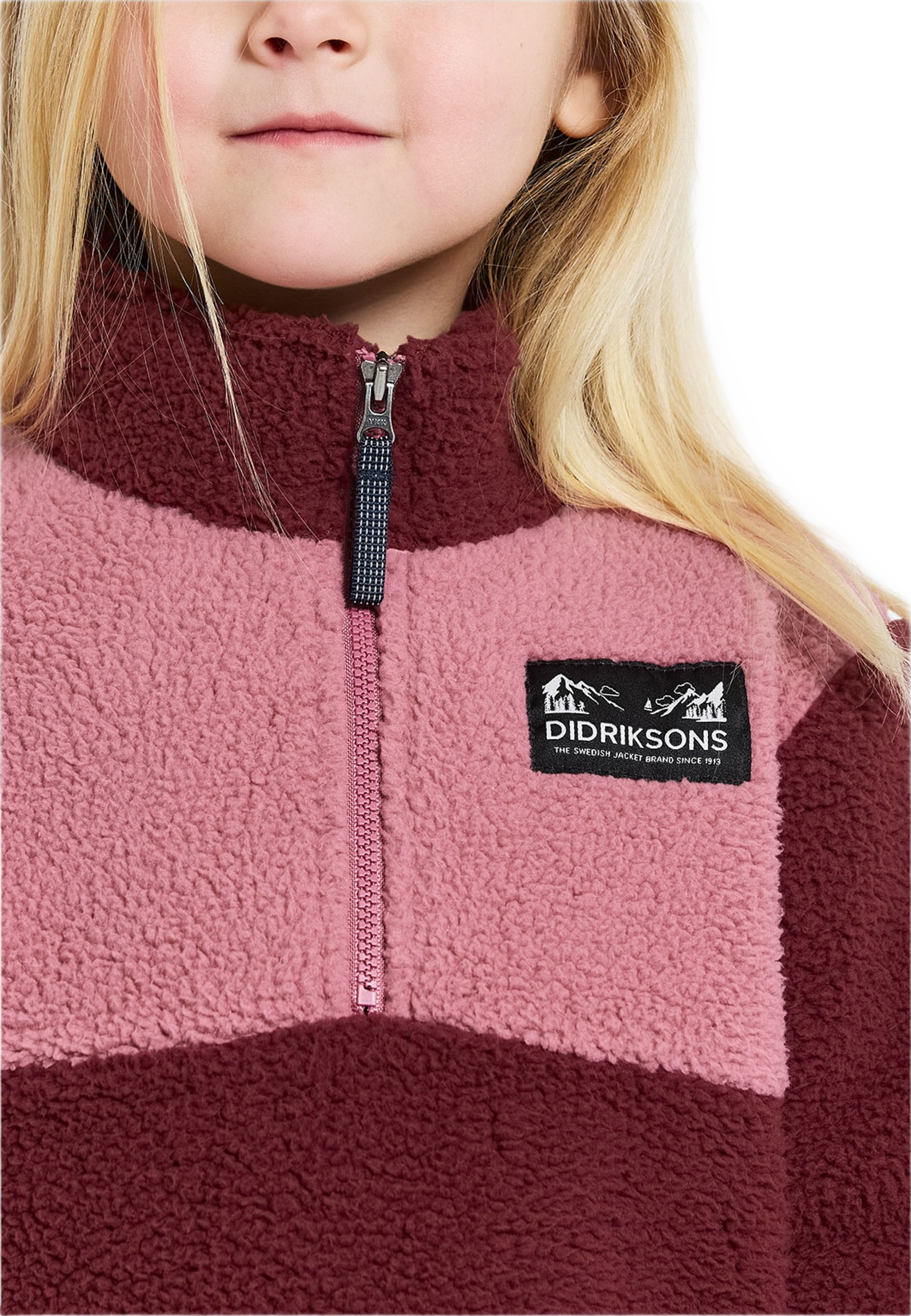Gosig Kids Halfzip, från Didriksons, i färgen Anemon Red.