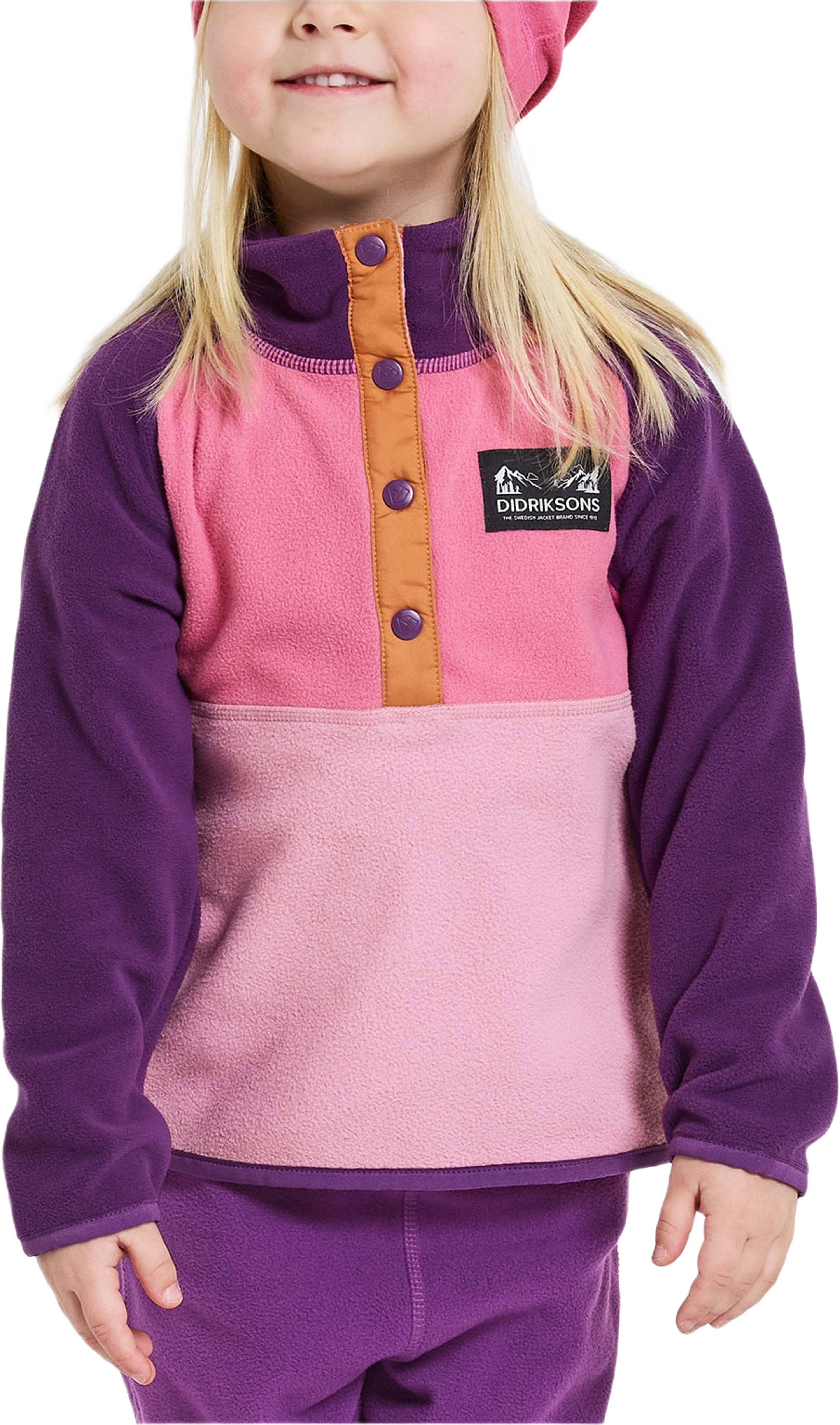 Monte Kids Half Button, från Didriksons, i färgen Light Heather Pink.
