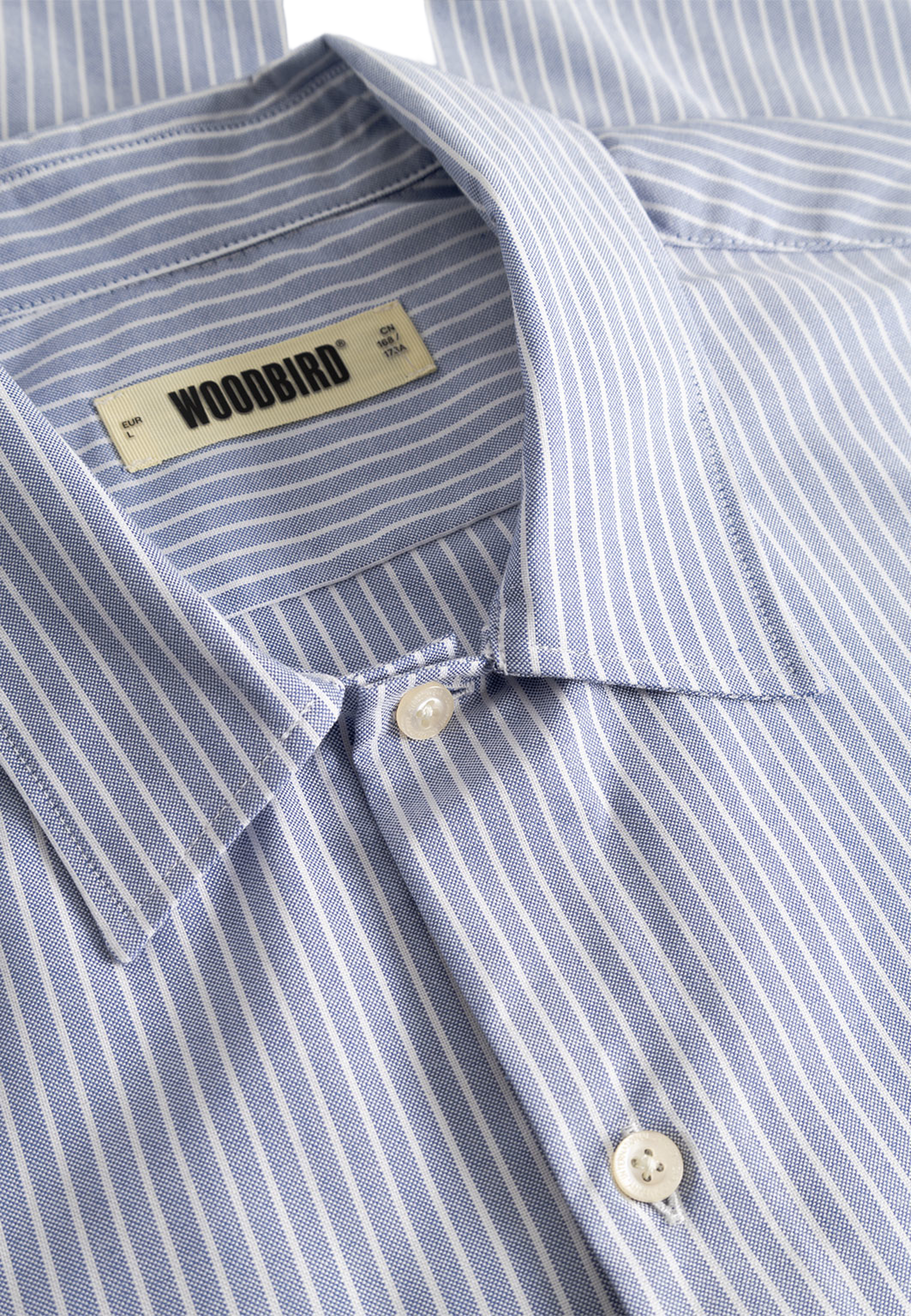 Wang Ox Flower Shirt, från Woodbird, i färgen Light Blue. Klicka för att öppna bilden i stort format