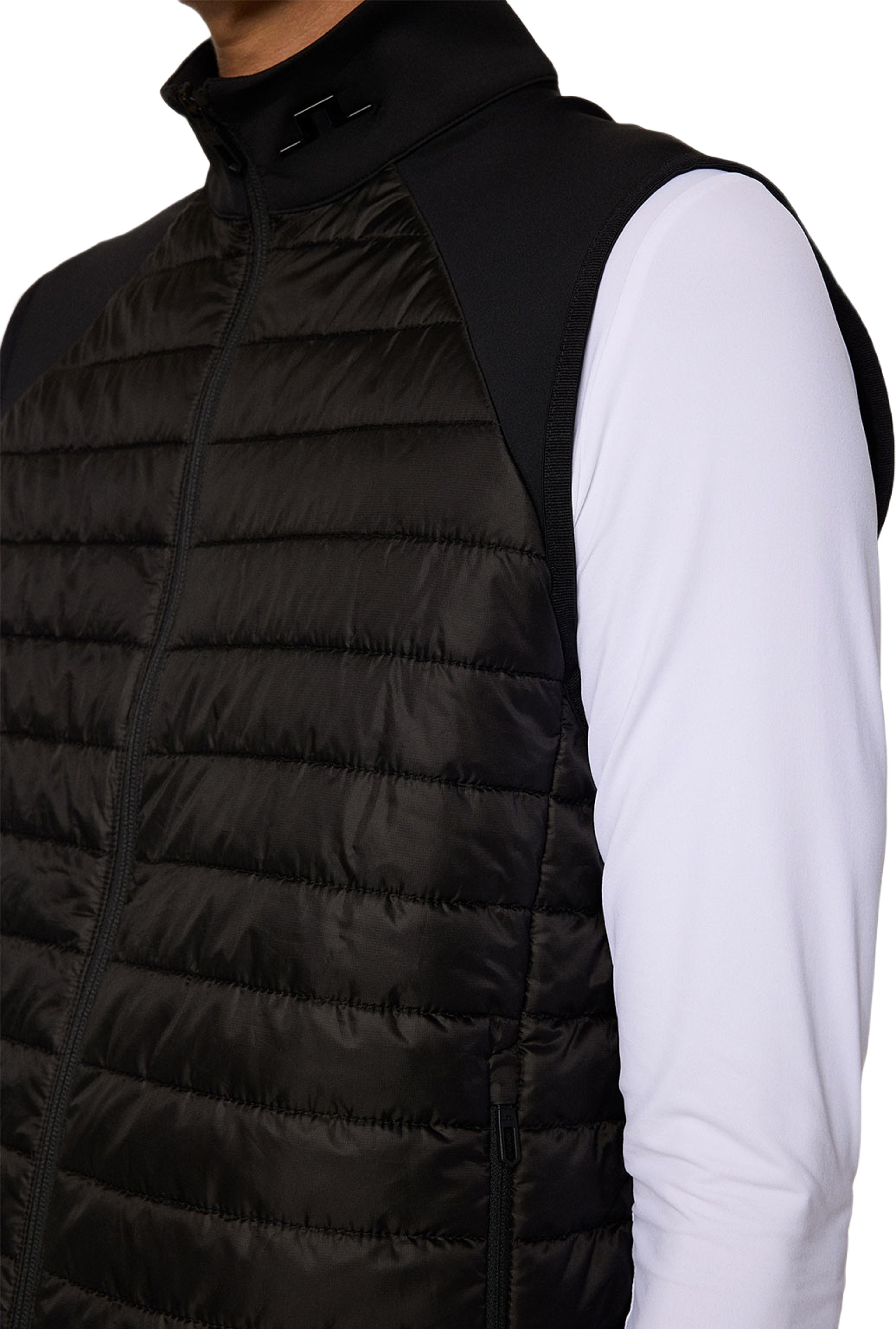 Hayden Quilt Hybrid Vest, från J.Lindeberg, i färgen Black.