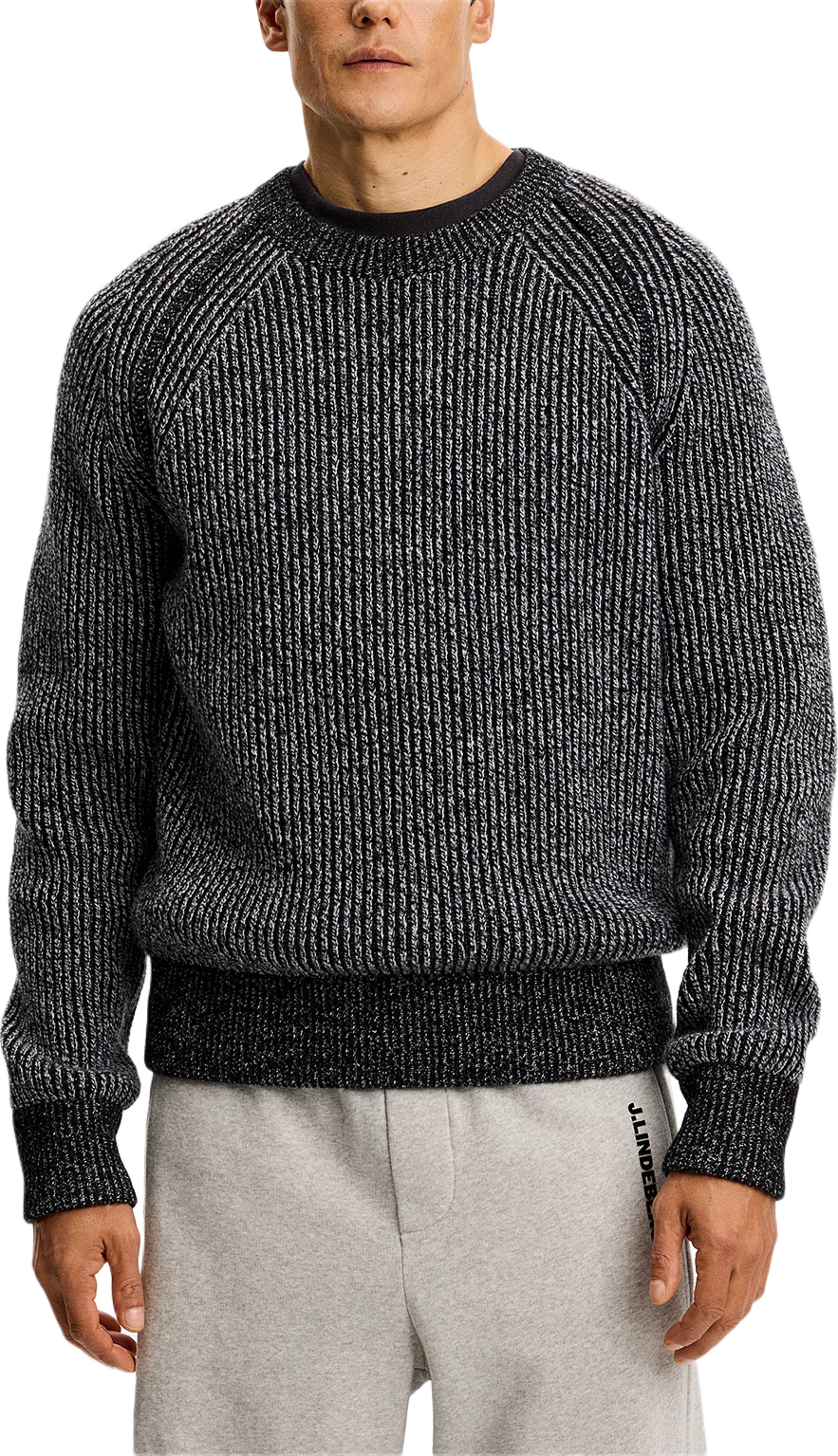 Fred Knitted Crew Neck, från J.Lindeberg, i färgen Dark Grey Melange. Klicka för att öppna bilden i stort format