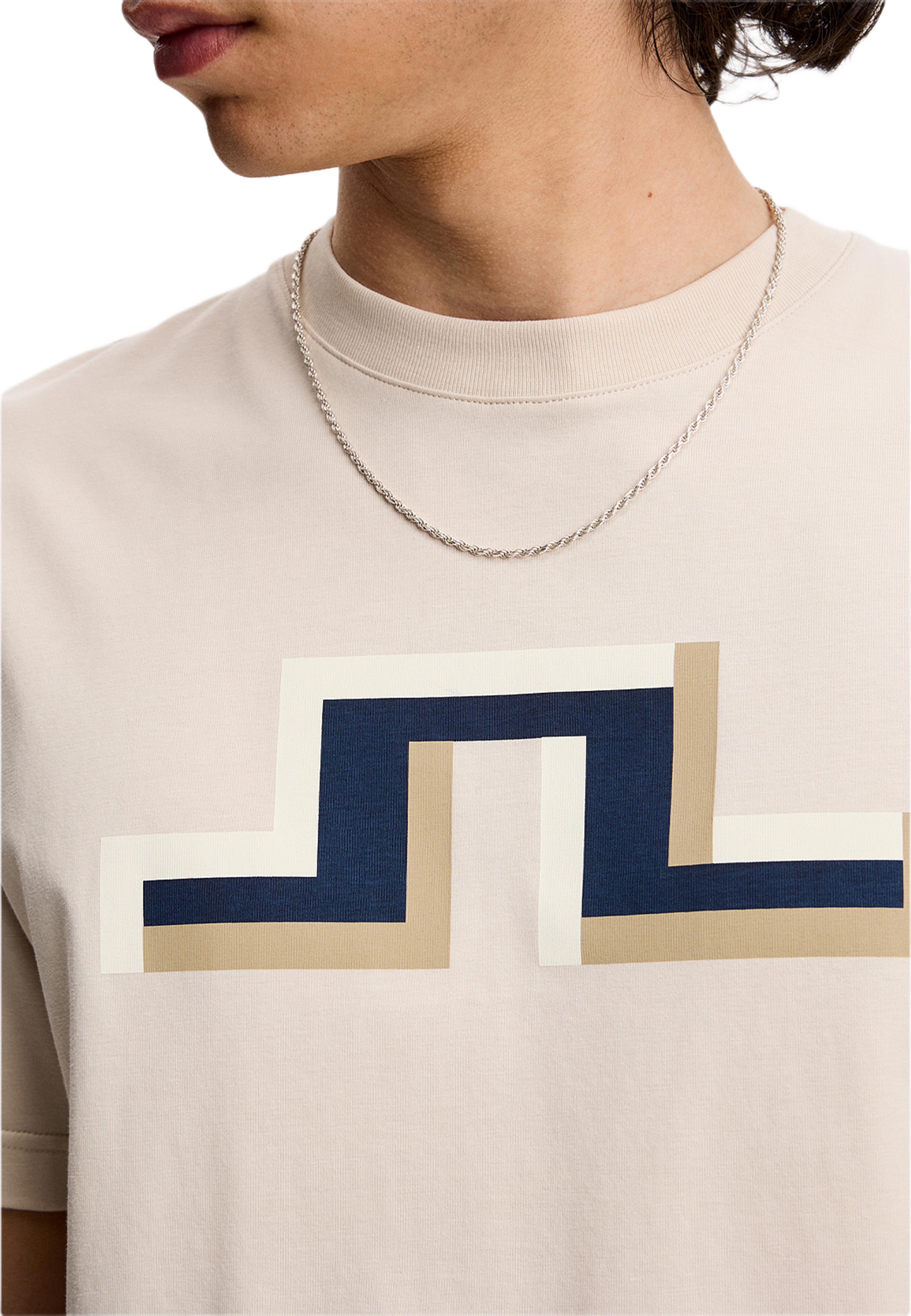 Parcie Seasonal Tee, från J.Lindeberg, i färgen Moonbeam. Klicka för att öppna bilden i stort format