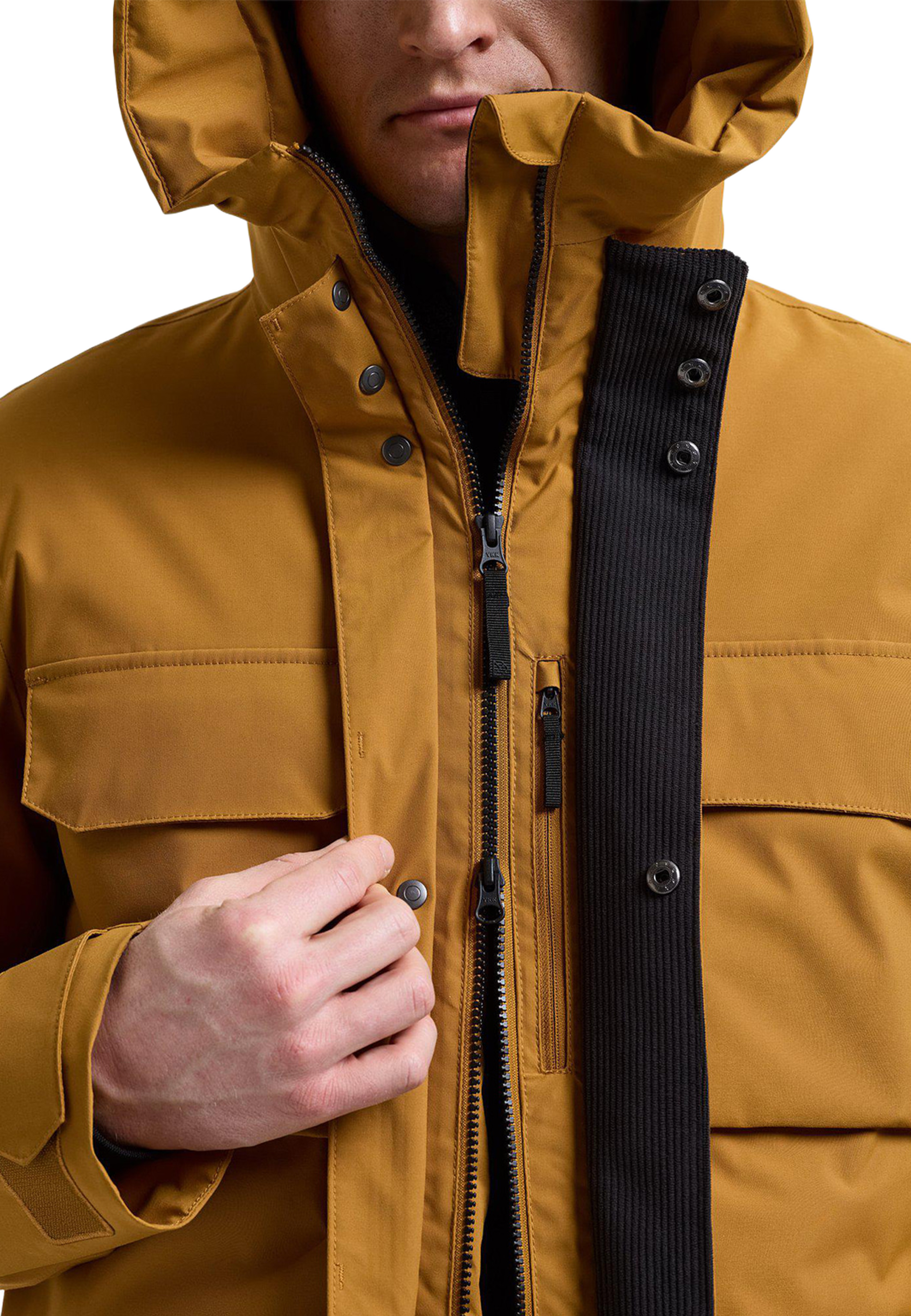 Aiden Parka 2, från Didriksons, i färgen Spice Brown. Klicka för att öppna bilden i stort format