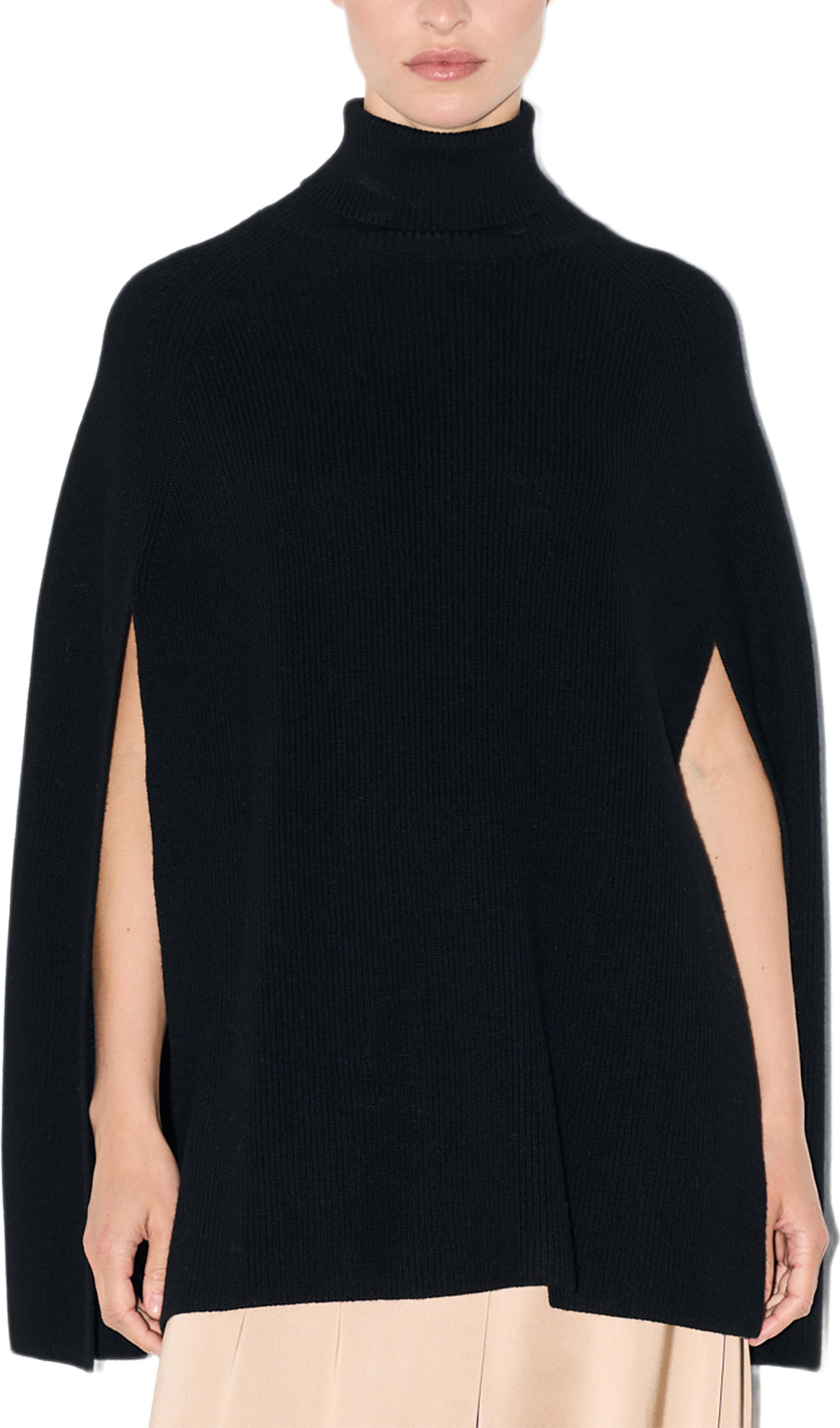 Unia Knitted Cape, från Twist & Tango, i färgen Black. Klicka för att öppna bilden i stort format