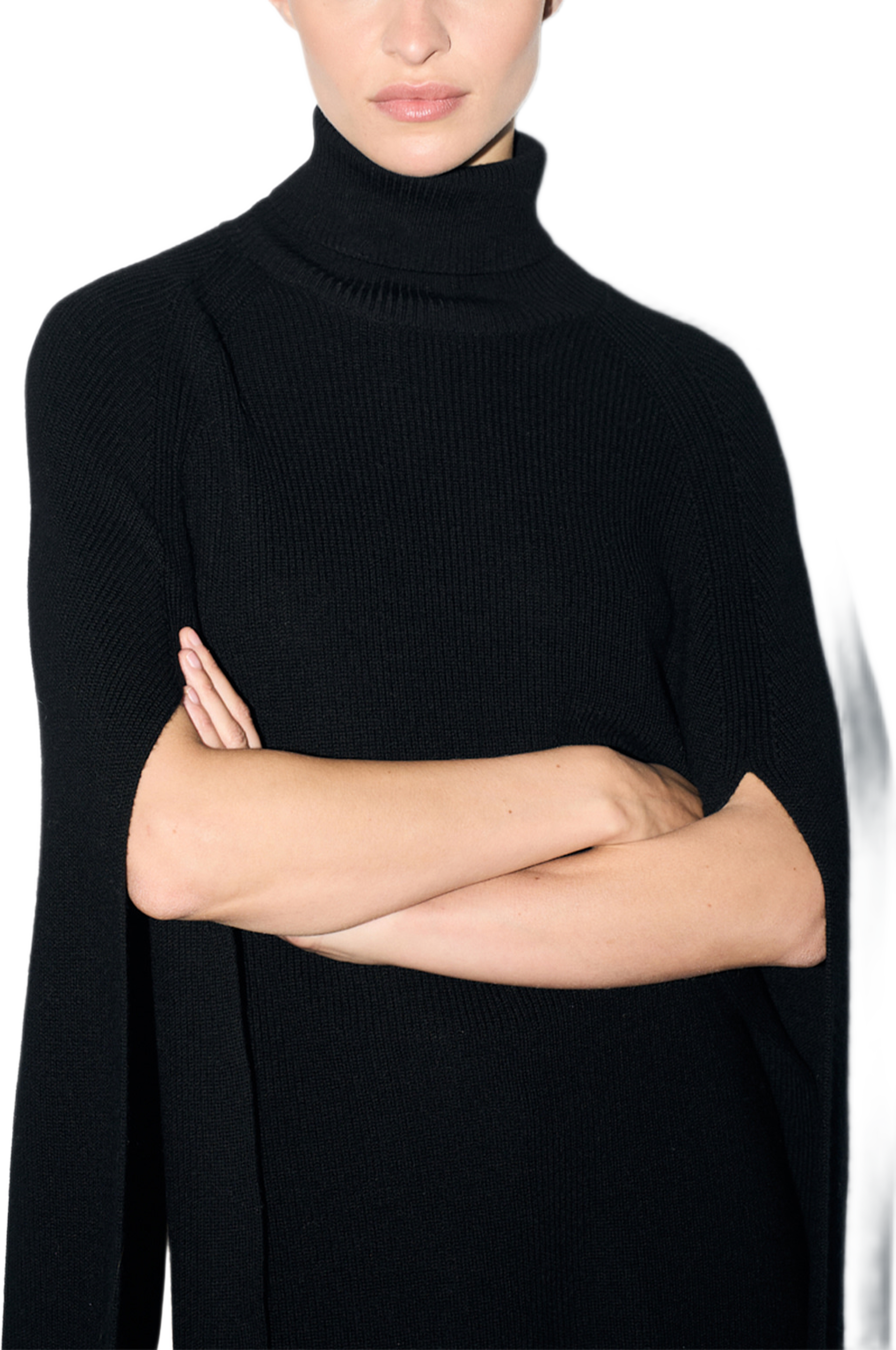 Unia Knitted Cape, från Twist & Tango, i färgen Black. Klicka för att öppna bilden i stort format