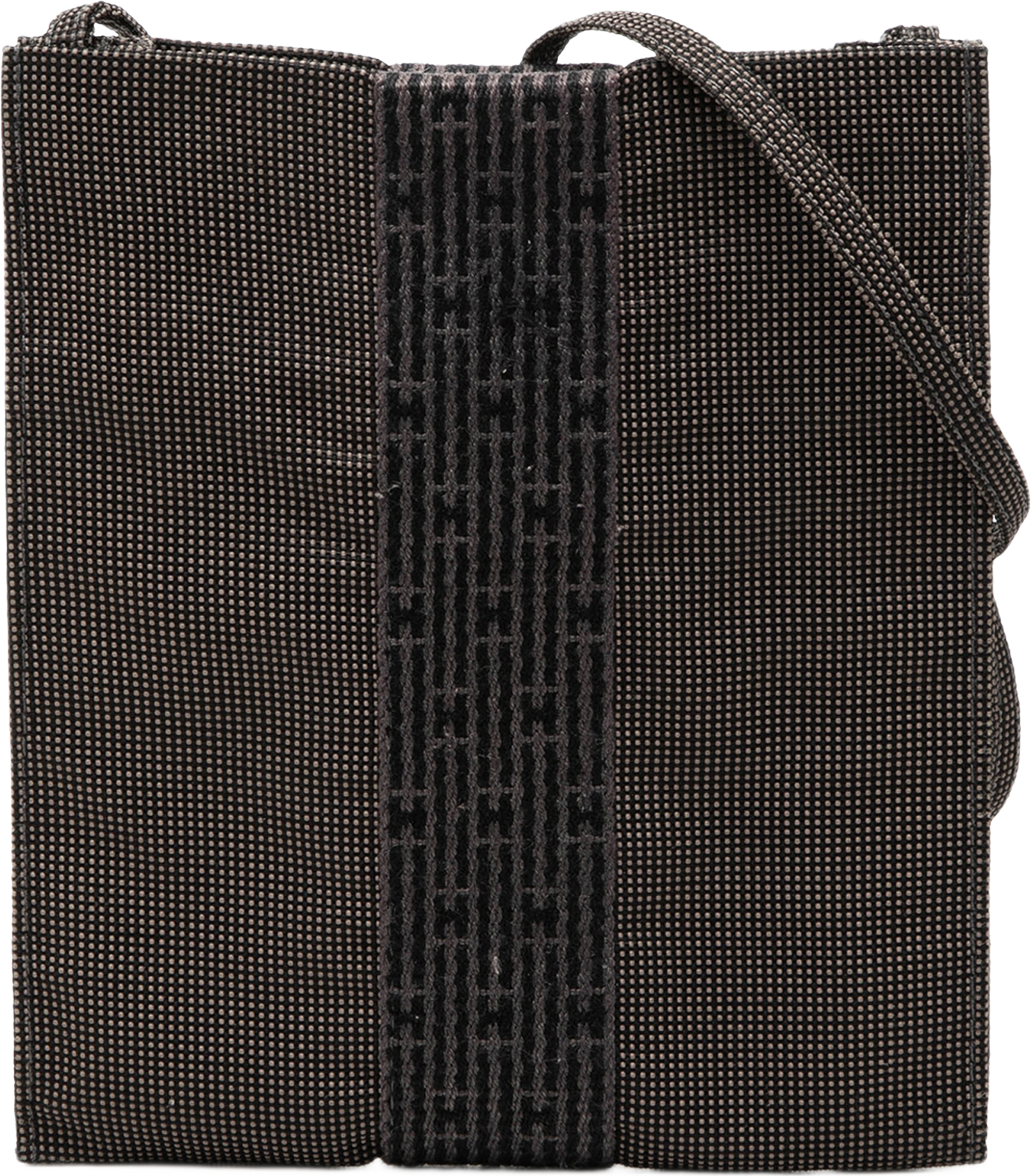 Hermès Canvas Herline Pochette, från Luxclusif, i färgen gray. Klicka för att öppna bilden i stort format