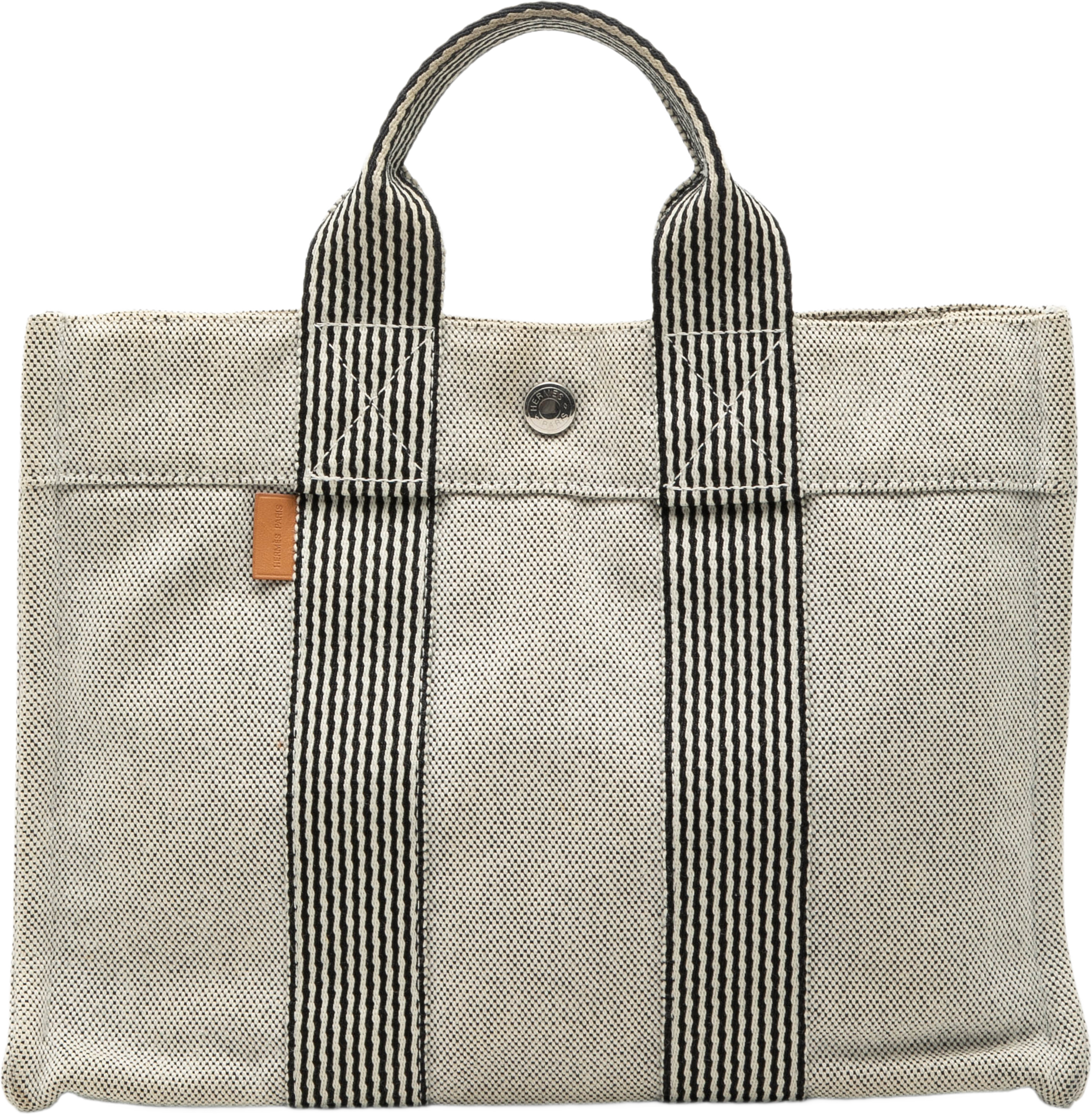 Hermès Canvas Fourre Tout Pm, från Luxclusif, i färgen gray. Klicka för att öppna bilden i stort format
