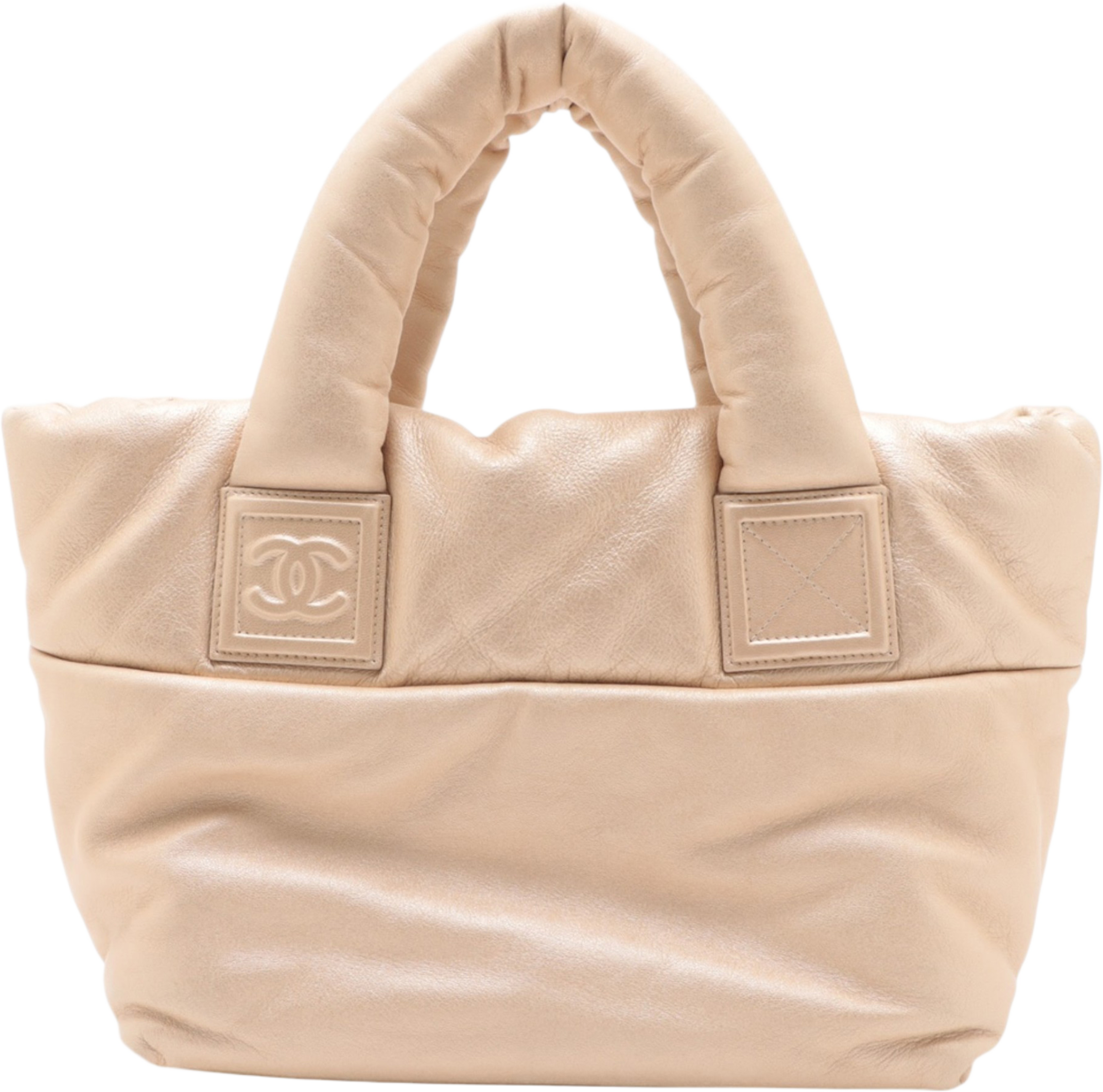 Chanel Small Lambskin Coco Cocoon Reversible Tote, från Luxclusif, i färgen beige. Klicka för att öppna bilden i stort format