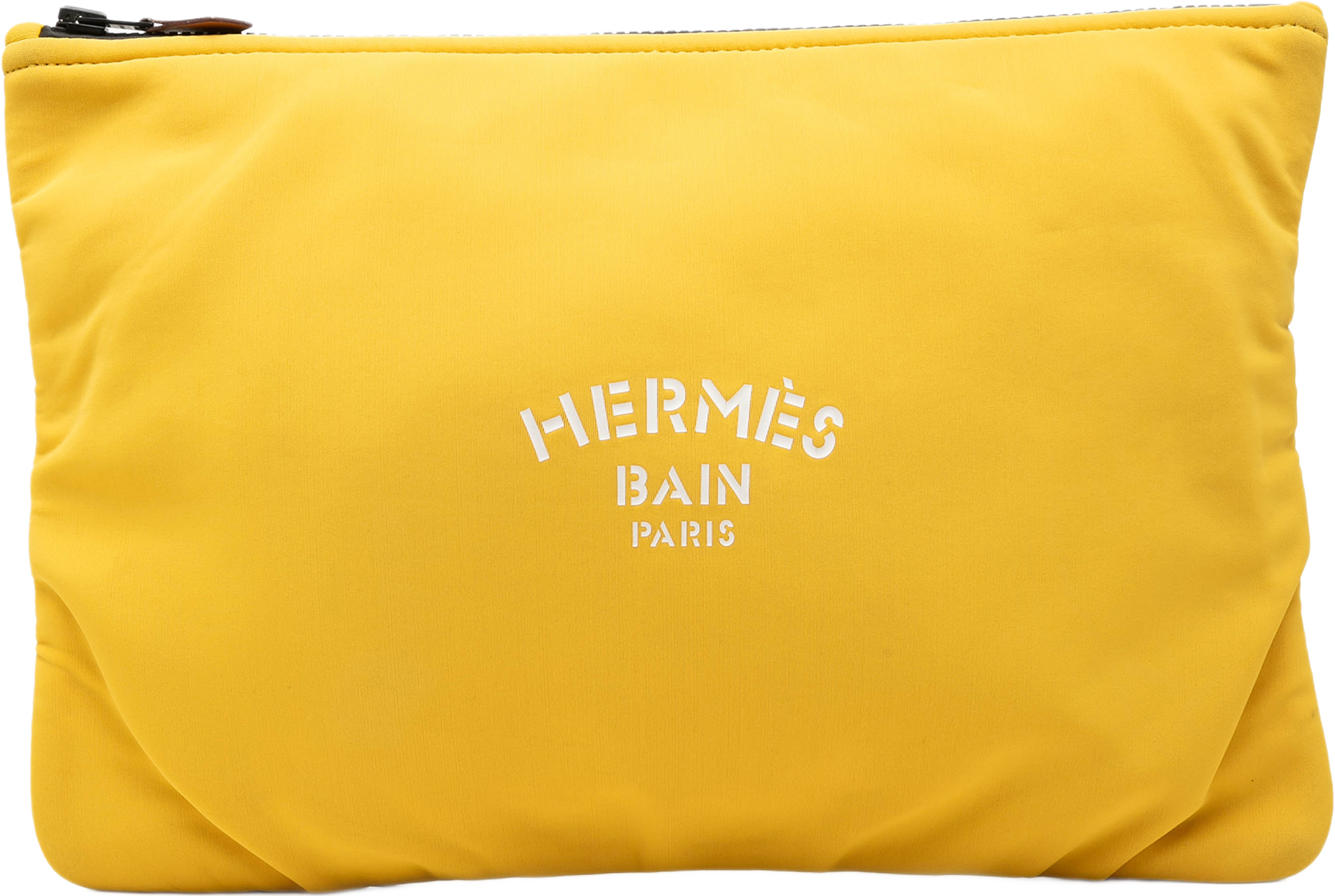 Hermès Medium Neoprene Neobain Case, från Luxclusif, i färgen gul. Klicka för att öppna bilden i stort format