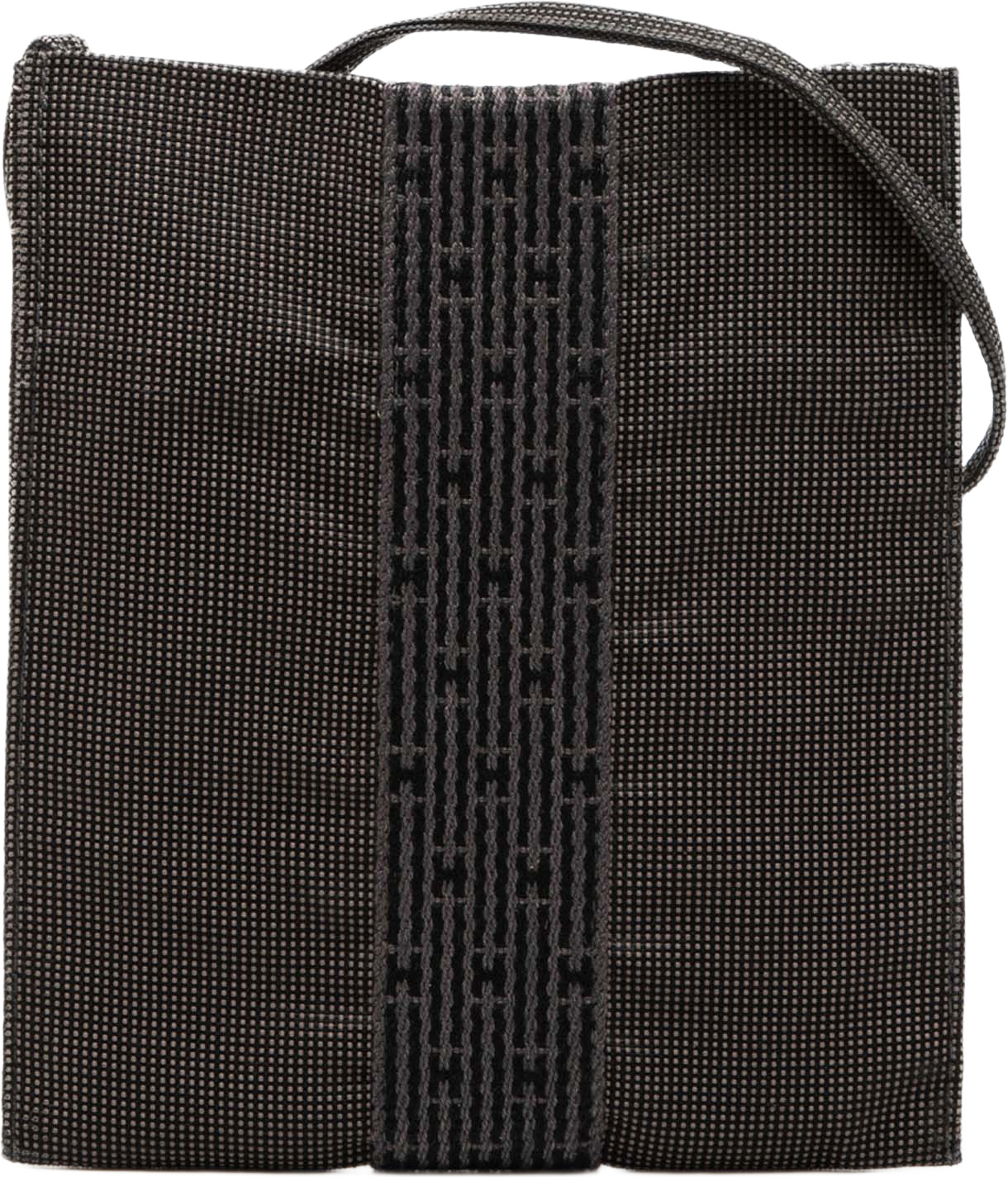 Hermès Canvas Herline Pochette, från Luxclusif, i färgen gray. Klicka för att öppna bilden i stort format