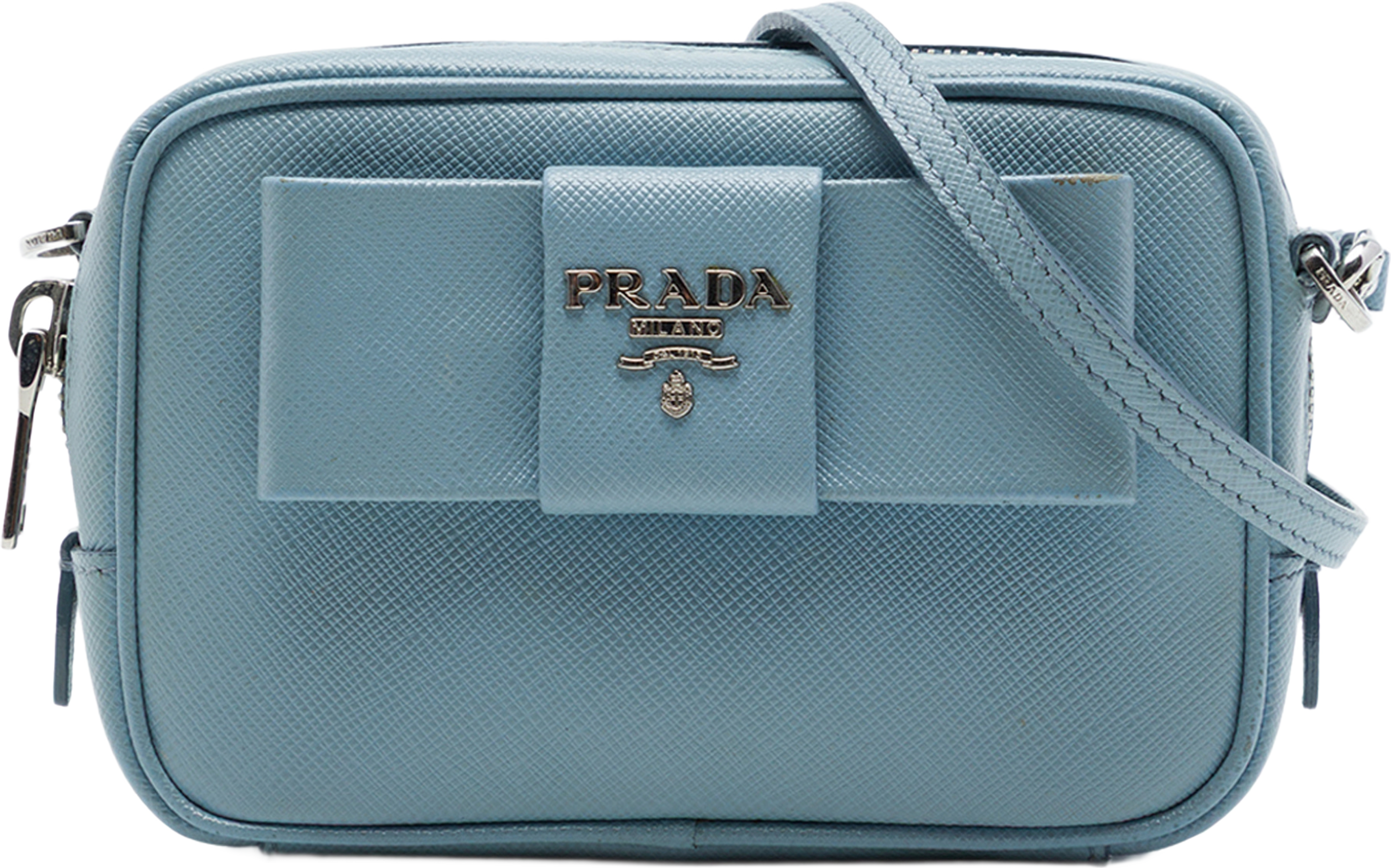 Prada Saffiano Fiocco Bow Camera Bag, från Luxclusif, i färgen blå. Klicka för att öppna bilden i stort format