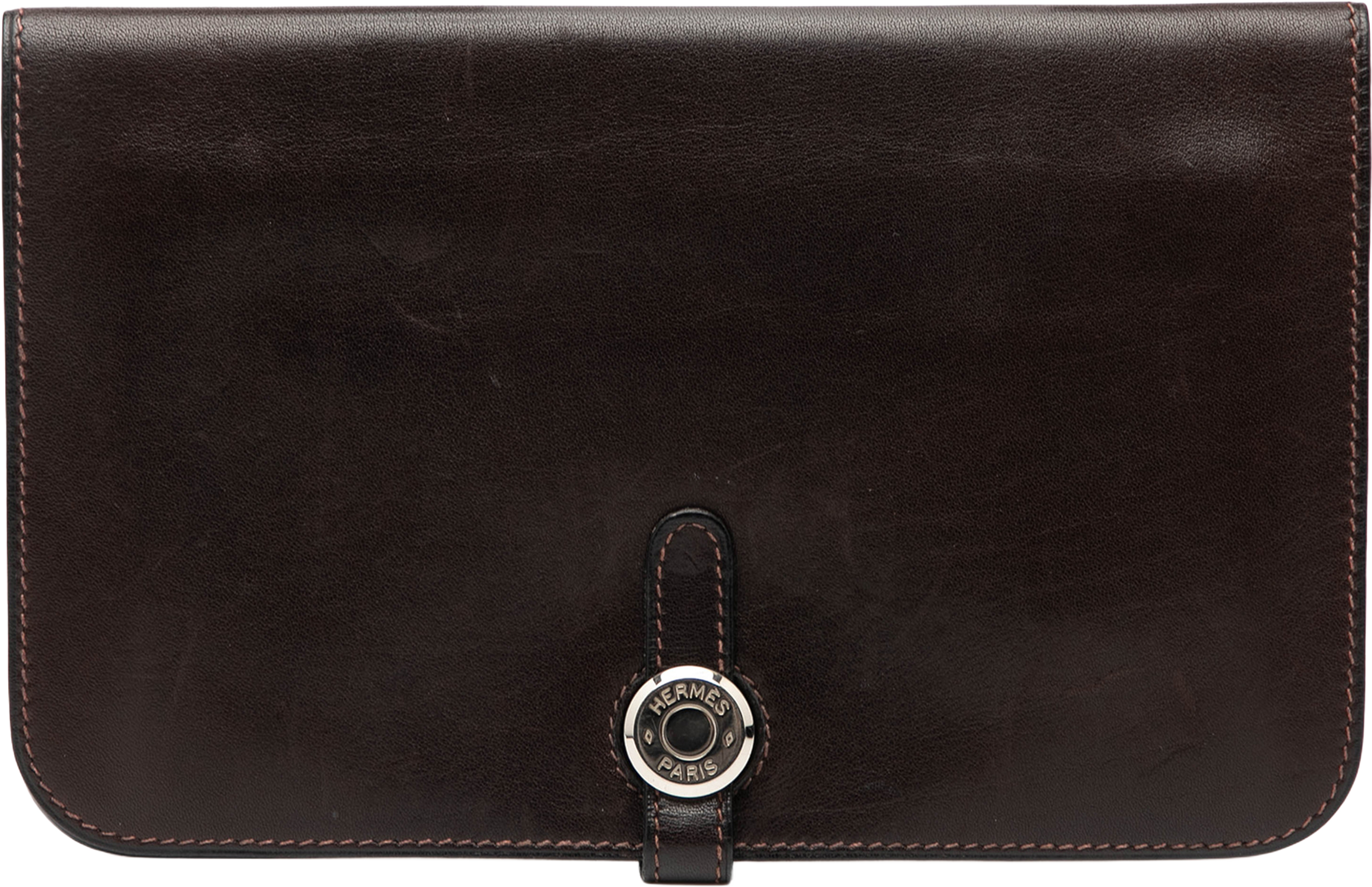 Hermès Swift Dogon Duo Wallet Gm, från Luxclusif, i färgen dark brown. Klicka för att öppna bilden i stort format