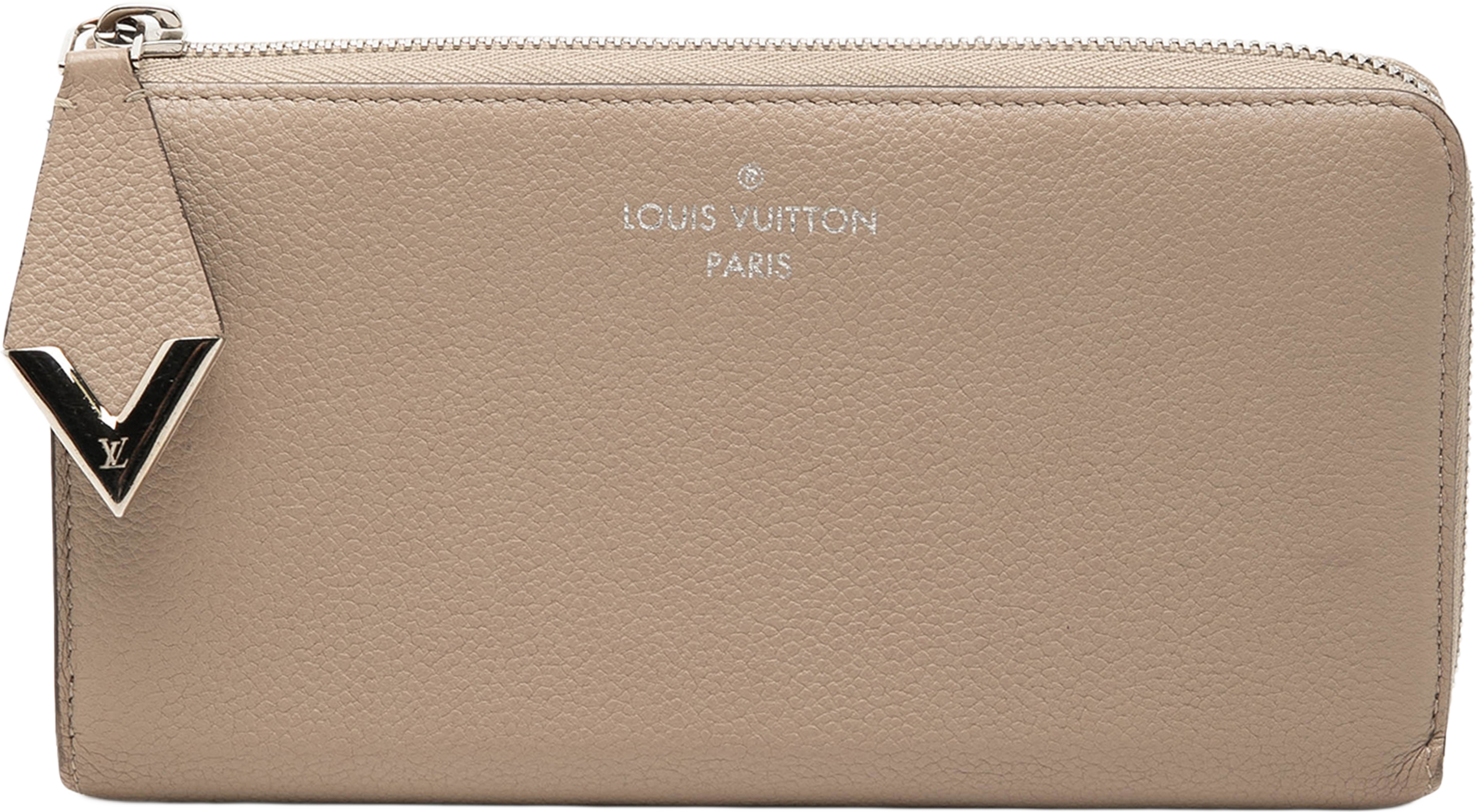 Louis Vuitton Taurillon Comete Wallet, från Luxclusif, i färgen beige. Klicka för att öppna bilden i stort format