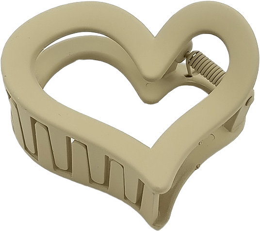 Hjärtformad Matt Hårklämma, från Complement, i färgen beige.