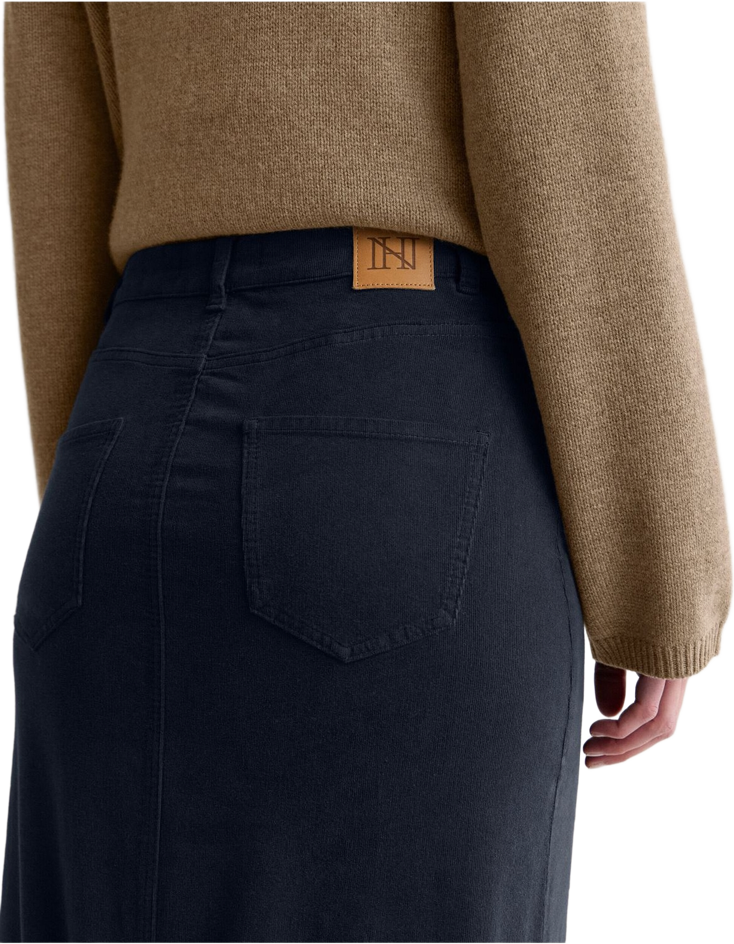 Kjol Minicord Elma, från Newhouse, i färgen marinblå.