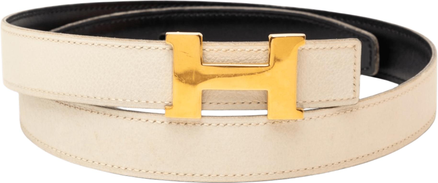 Hermès Clemence And Gulliver Constance H Reversible Belt, från Luxclusif, i färgen ivory.
