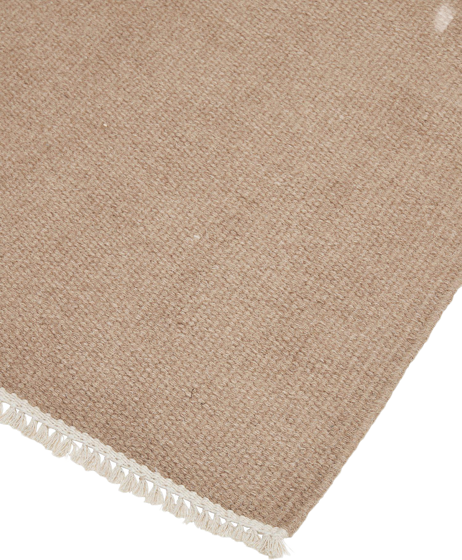 John Ullmatta, från Svanefors, i färgen beige.