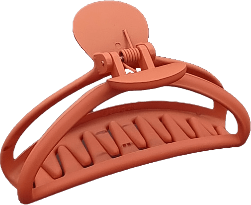 Gummerad Hårklämma, från Complement, i färgen orange.