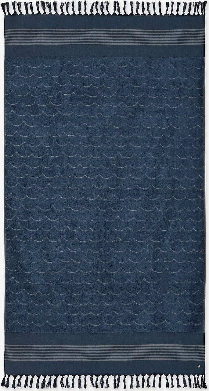 Strandhandduk Våg, från emmamalena, i färgen petrol.
