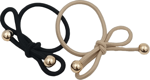 2 Pack Hårsnoddar Med Rosett, från Complement, i färgen beige.