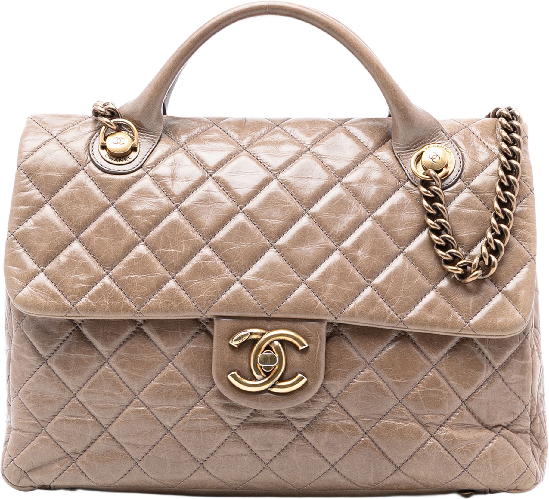 Chanel Large Glazed Calfskin Castle Rock Top Handle Flap, från Luxclusif, i färgen light brown.