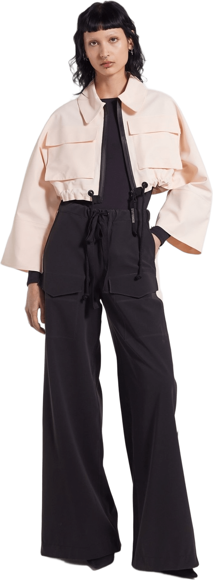 Lilla Tre Zip Raincoat, från Stutterheim, i färgen peach.