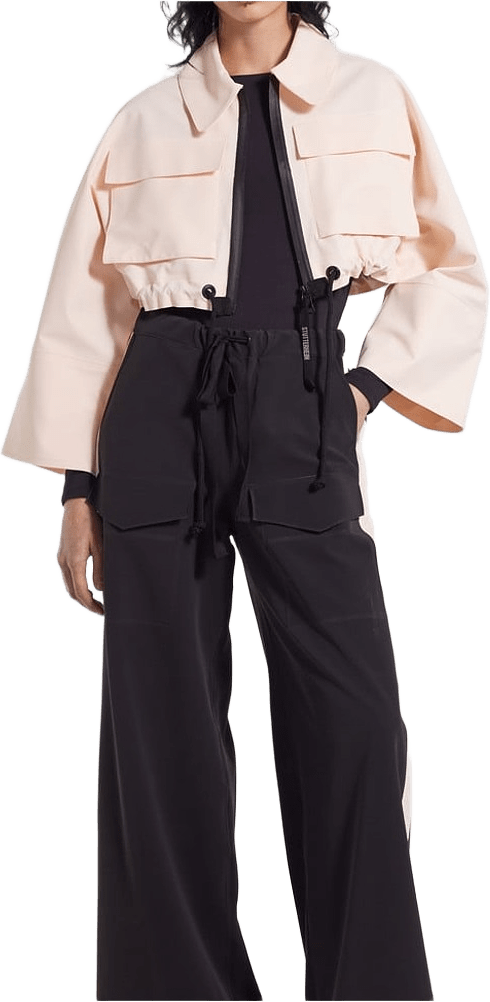 Lilla Tre Zip Raincoat, från Stutterheim, i färgen peach.