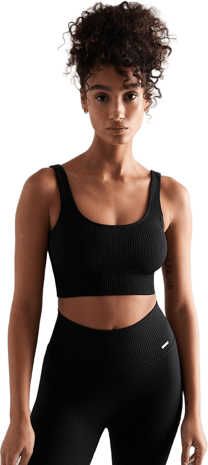 Black Ribbed Seamless Bra, från aim'n, i färgen black.