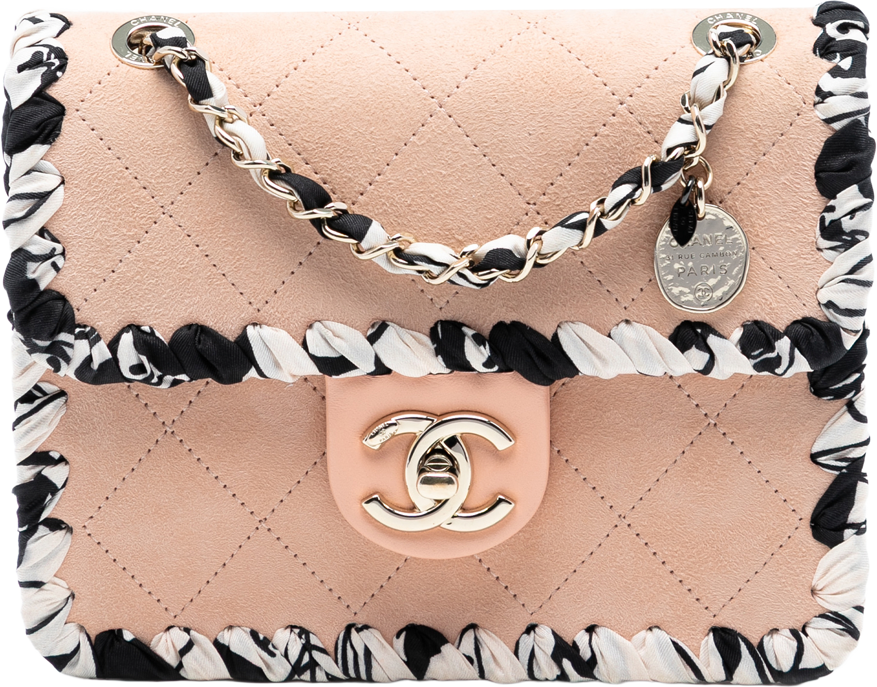 Chanel Mini Quilted Suede Braided My Own Frame Flap, från Luxclusif, i färgen beige.