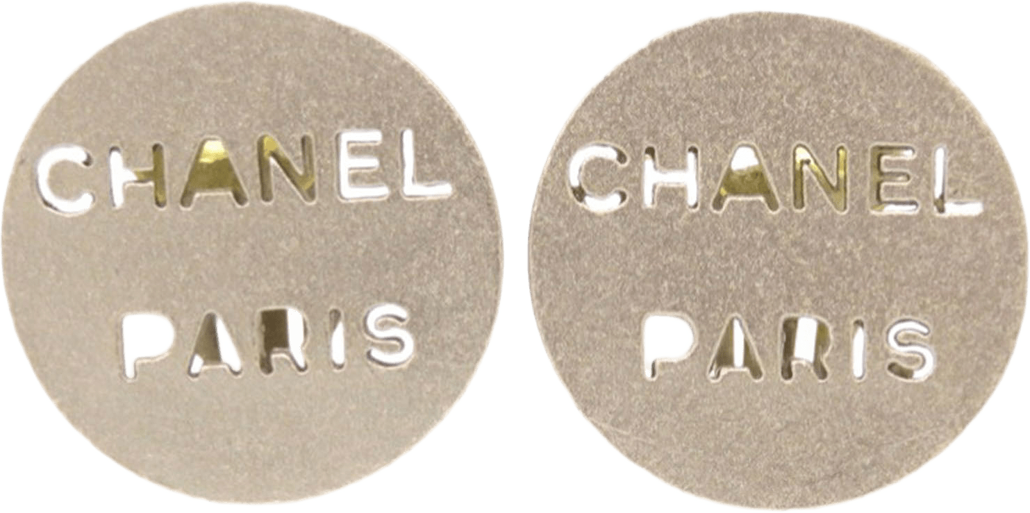 Chanel Brass Cut Out Logo Round Clip On Earrings, från Luxclusif, i färgen silver.